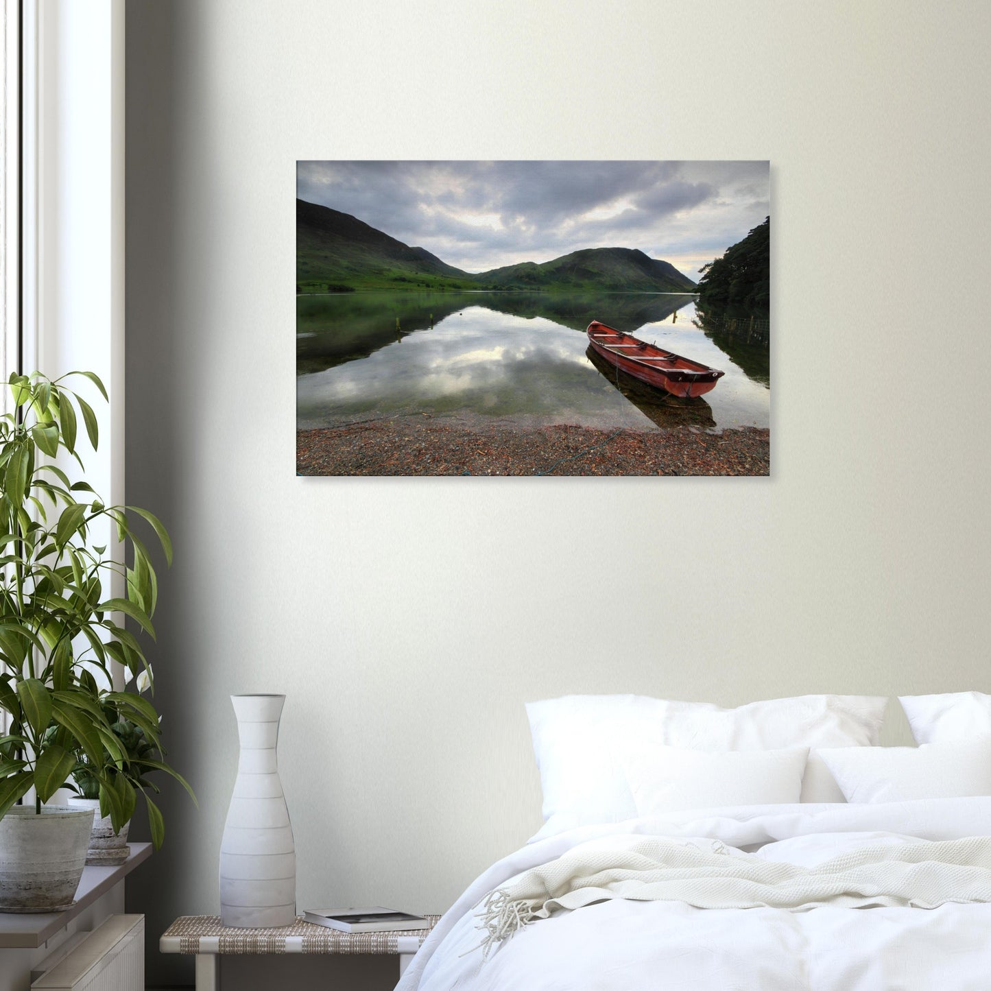 Peaceful lakeshore scene in Cumbria with distant fells