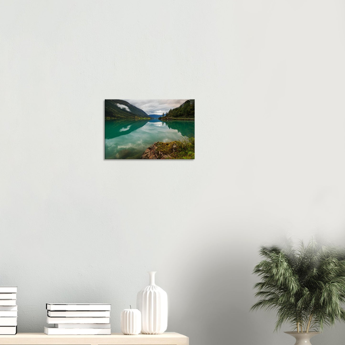 Norway canvas art featuring mossy rocks and symmetrical valley reflections.