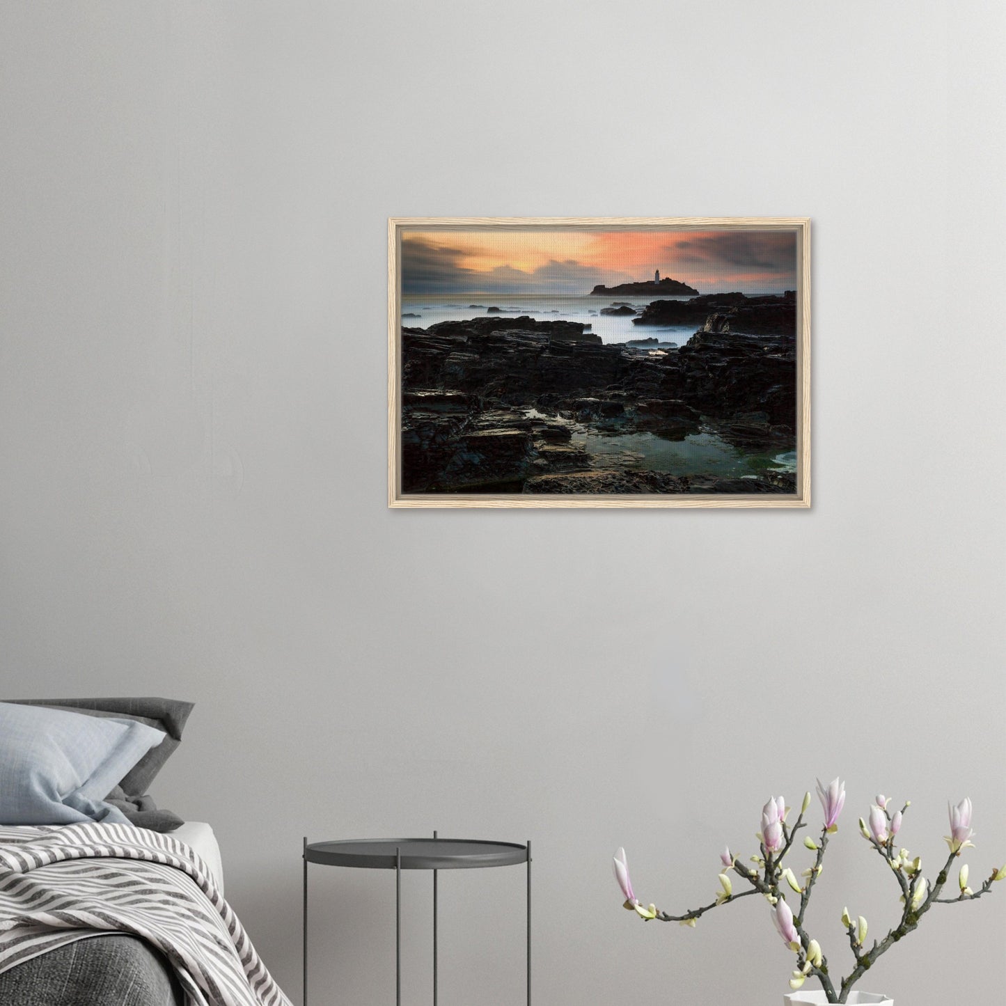 Lighthouse silhouetted against sunset sky in Cornwall canvas