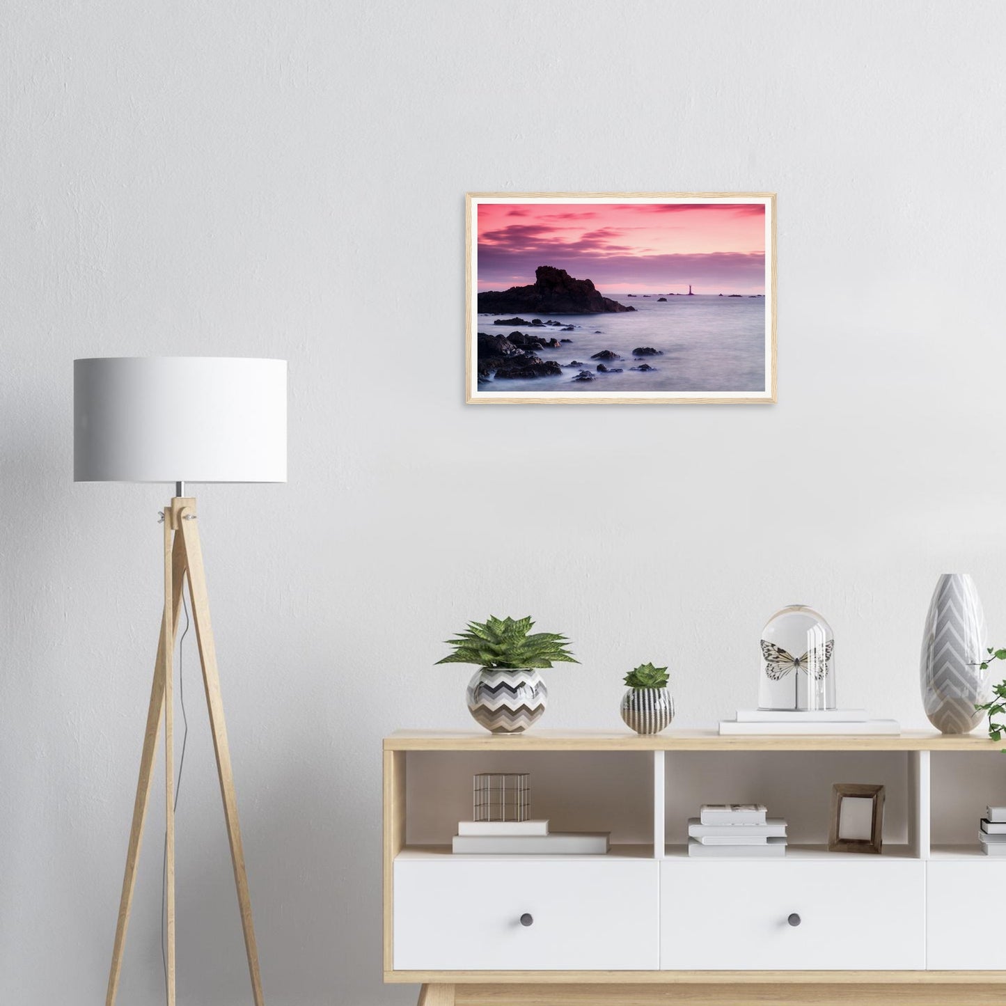 Atmospheric Guernsey sunset framed wall art of lighthouse and rocks