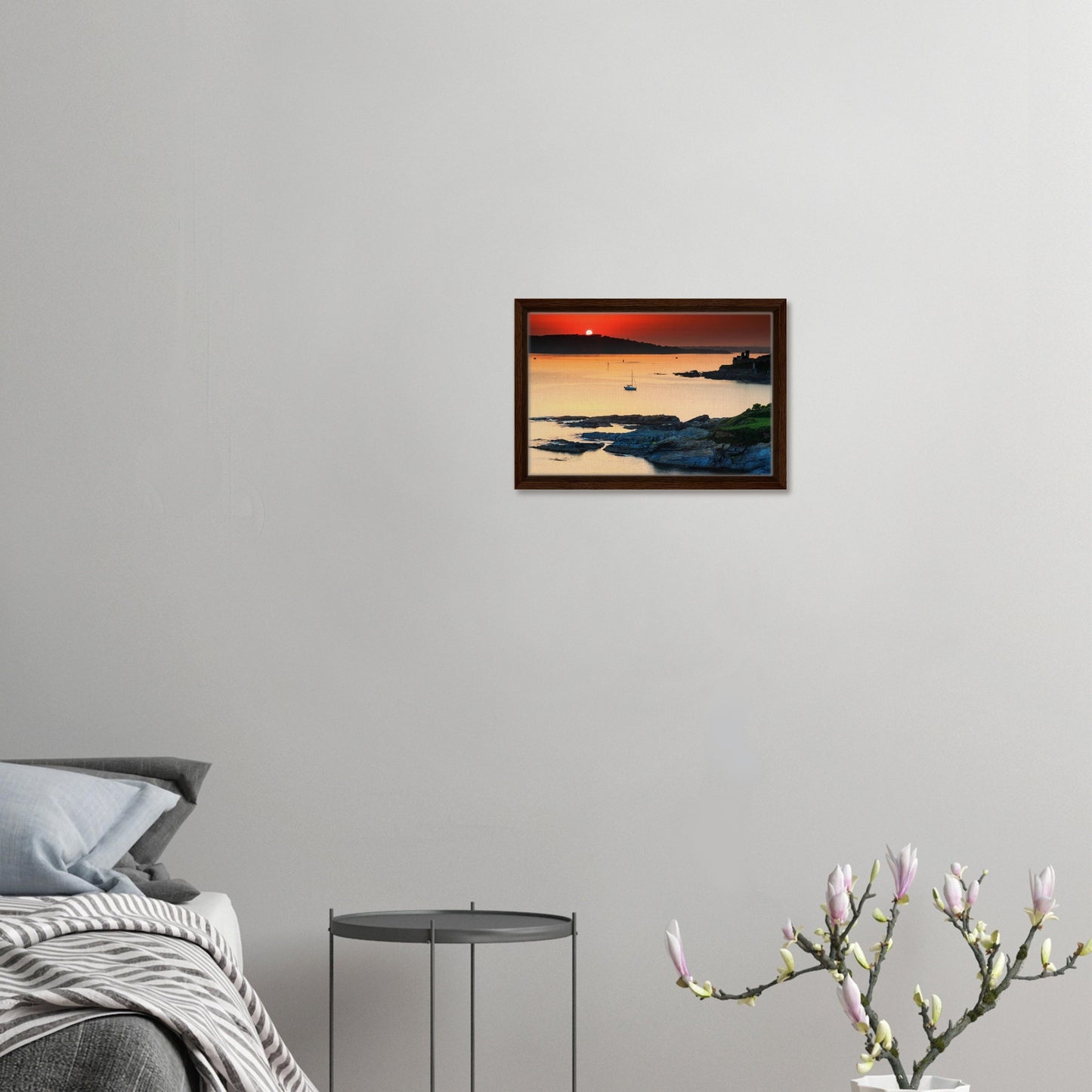 Devon coast sunset with glowing horizon and calm water in artwork