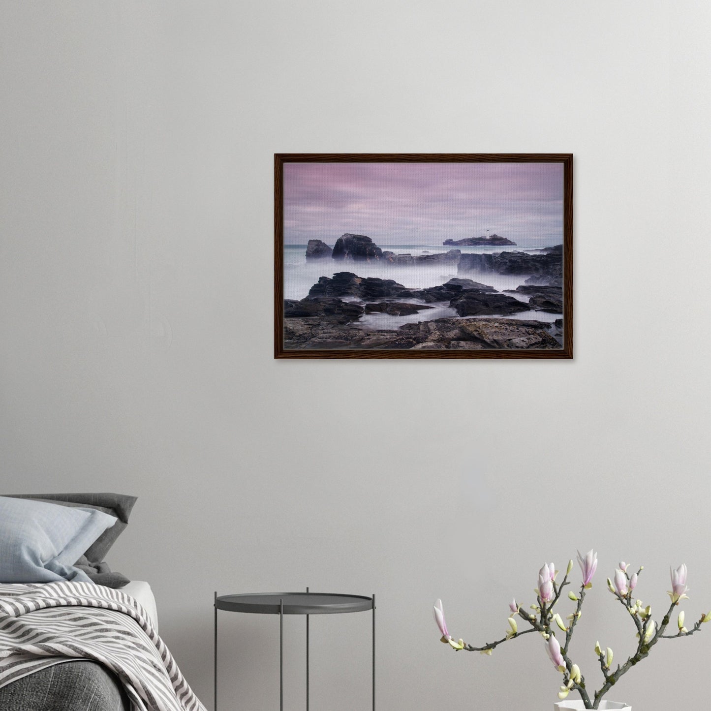 Canvas print of Cornish lighthouse island and soft cloudscape