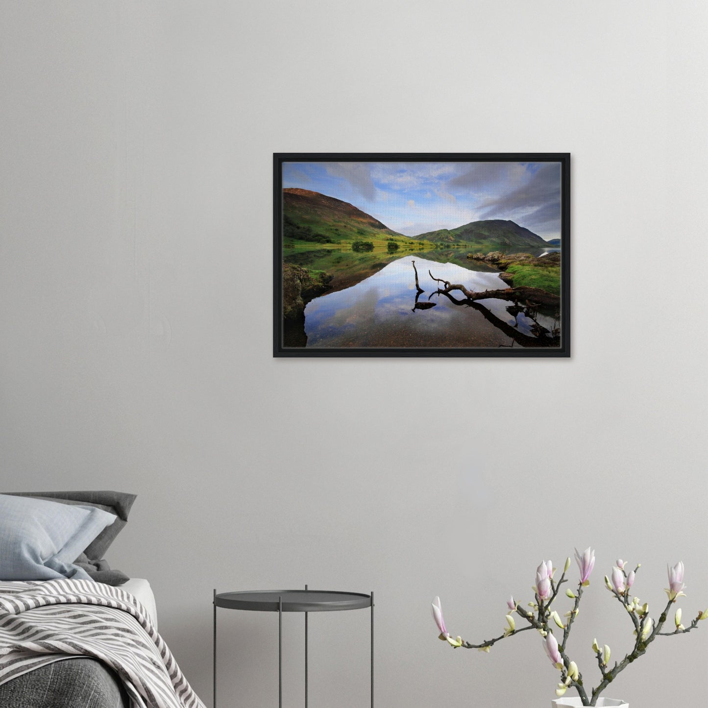 Reflective lake with soft sky and fells in framed wall art