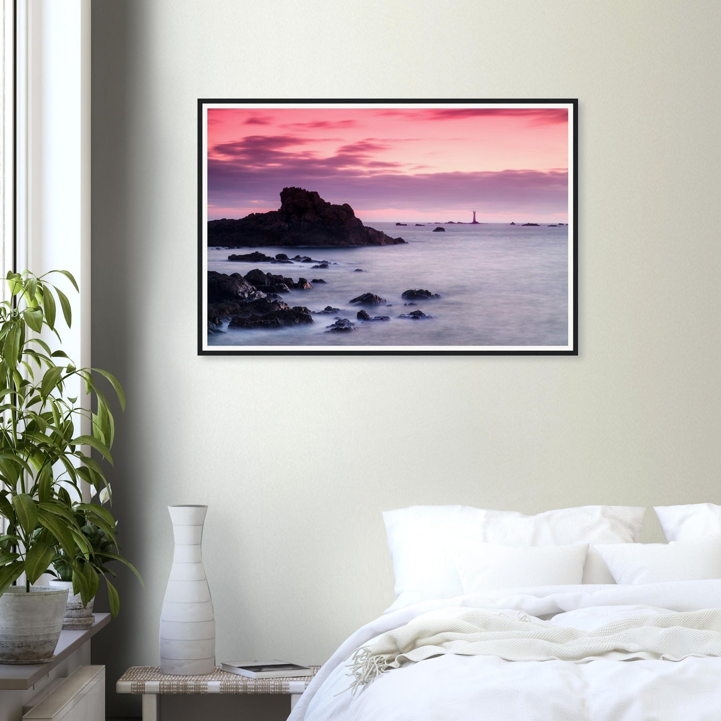 Serene lighthouse silhouette framed wall art at Guernsey sunset