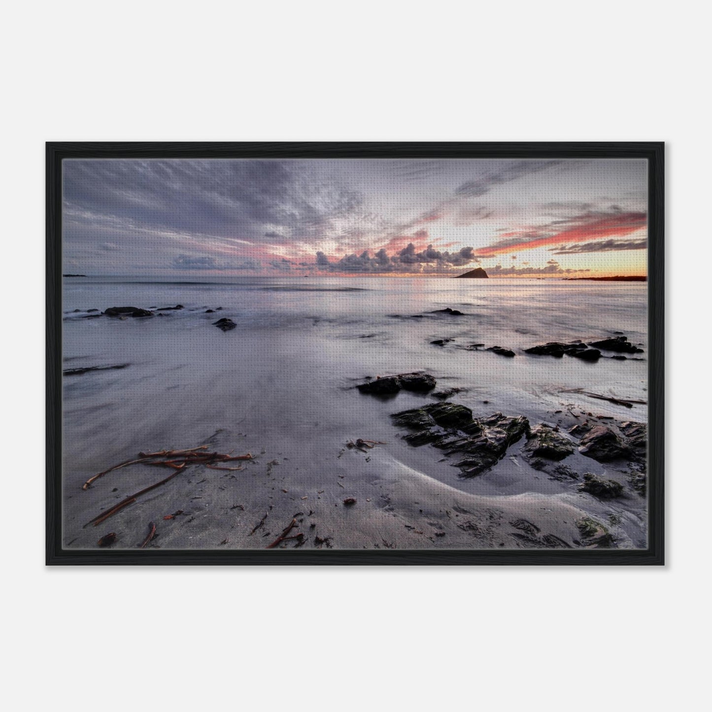 The Mewstone silhouetted at sunset from Wembury Beach in framed art