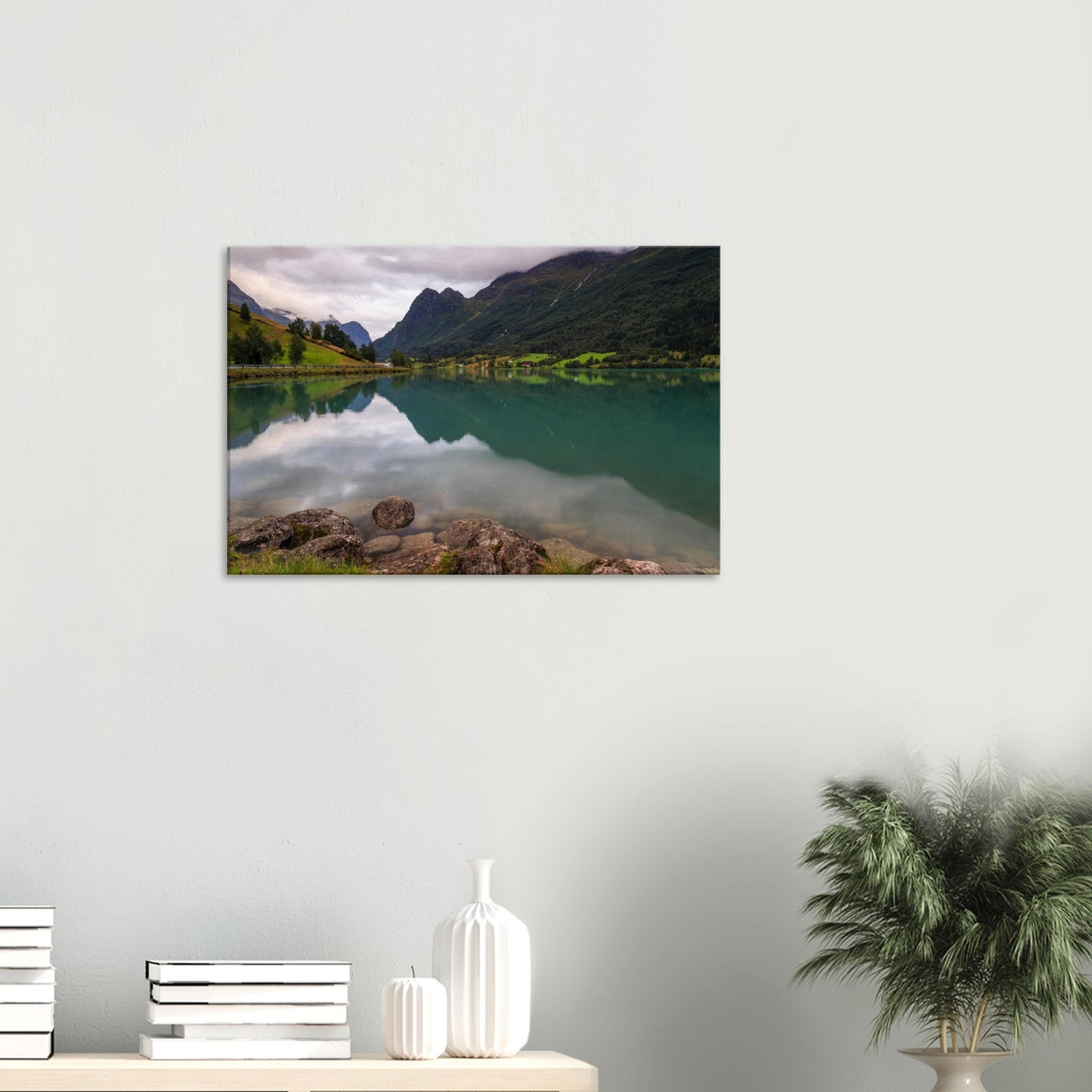 Detailed canvas artwork depicting peaceful Lake Floen with mirrored sky reflections and verdant valley surroundings.