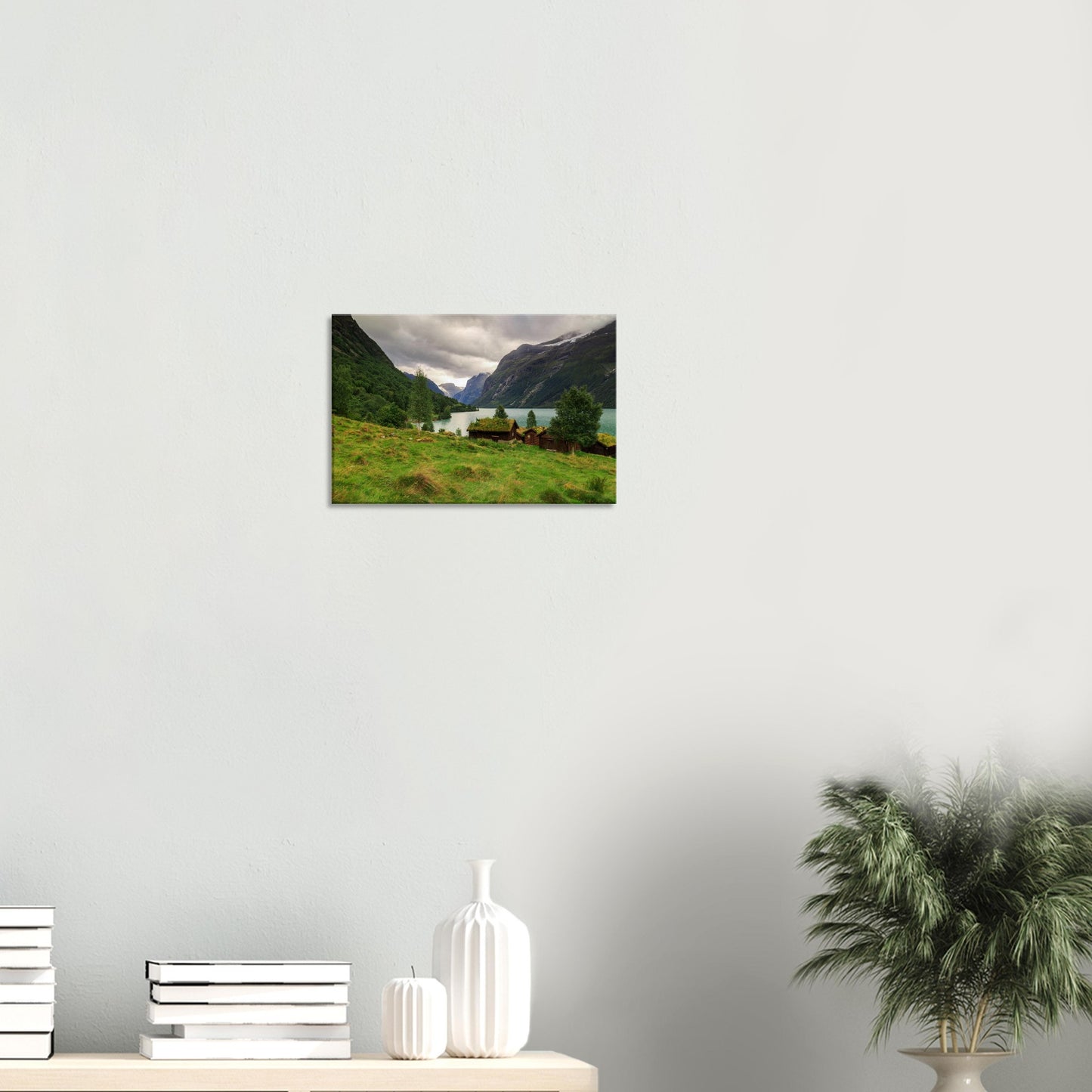 Serene landscape canvas depicting Lodalen Valley’s idyllic cabins by the lakeshore framed by dense forests and rocky peaks.
