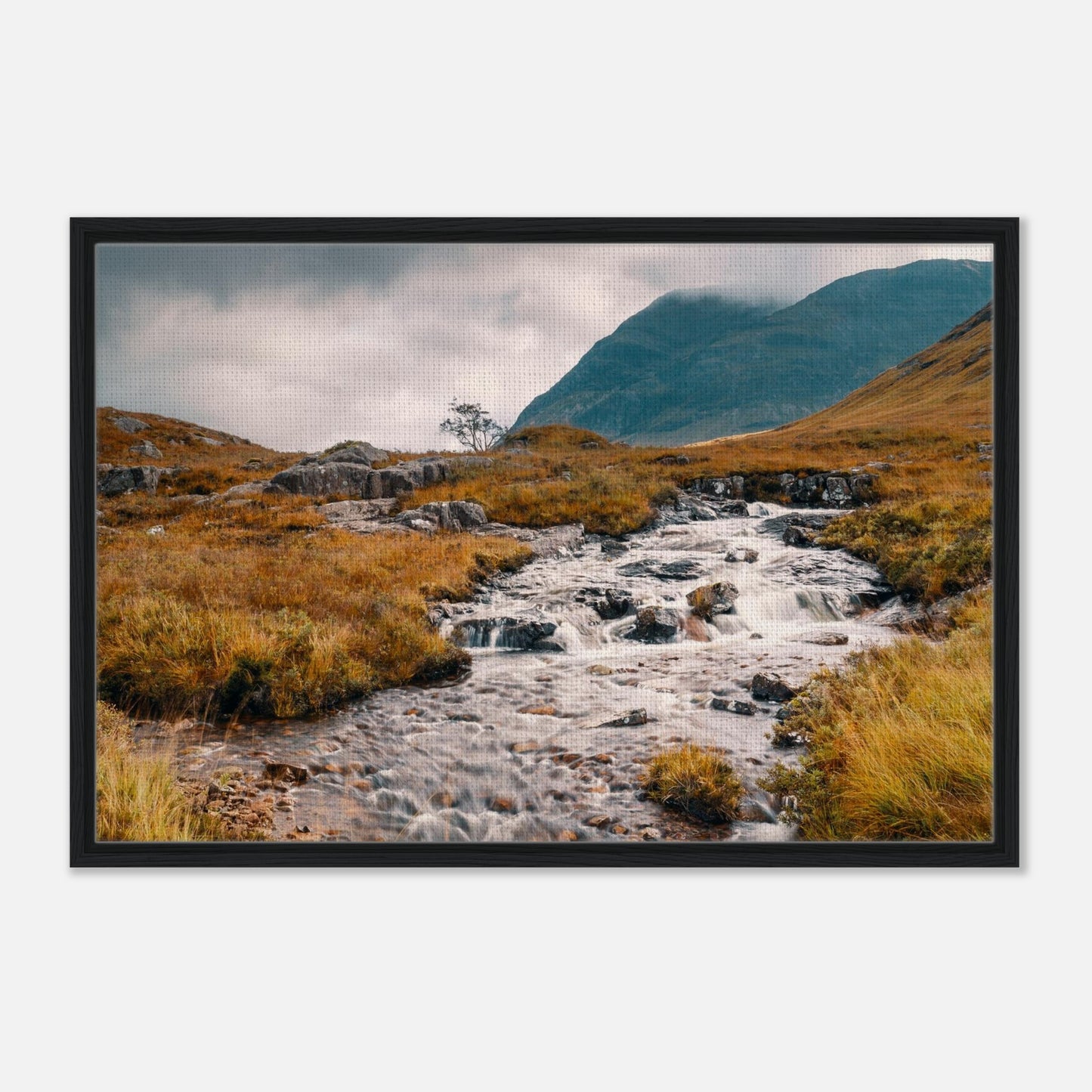 Highland stream flowing through Glencoe moorland