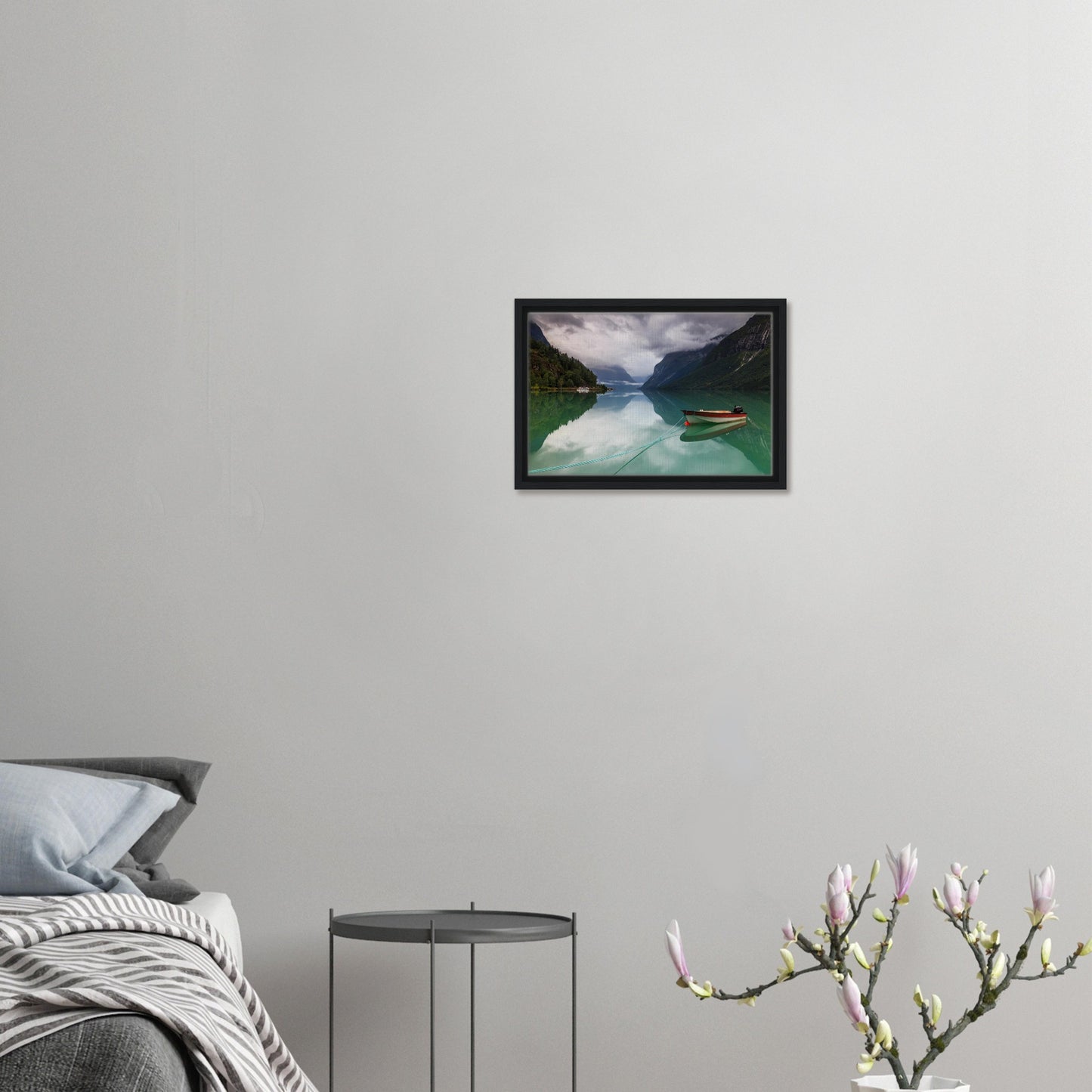 Peaceful Norwegian lake view with dramatic misty cliffs