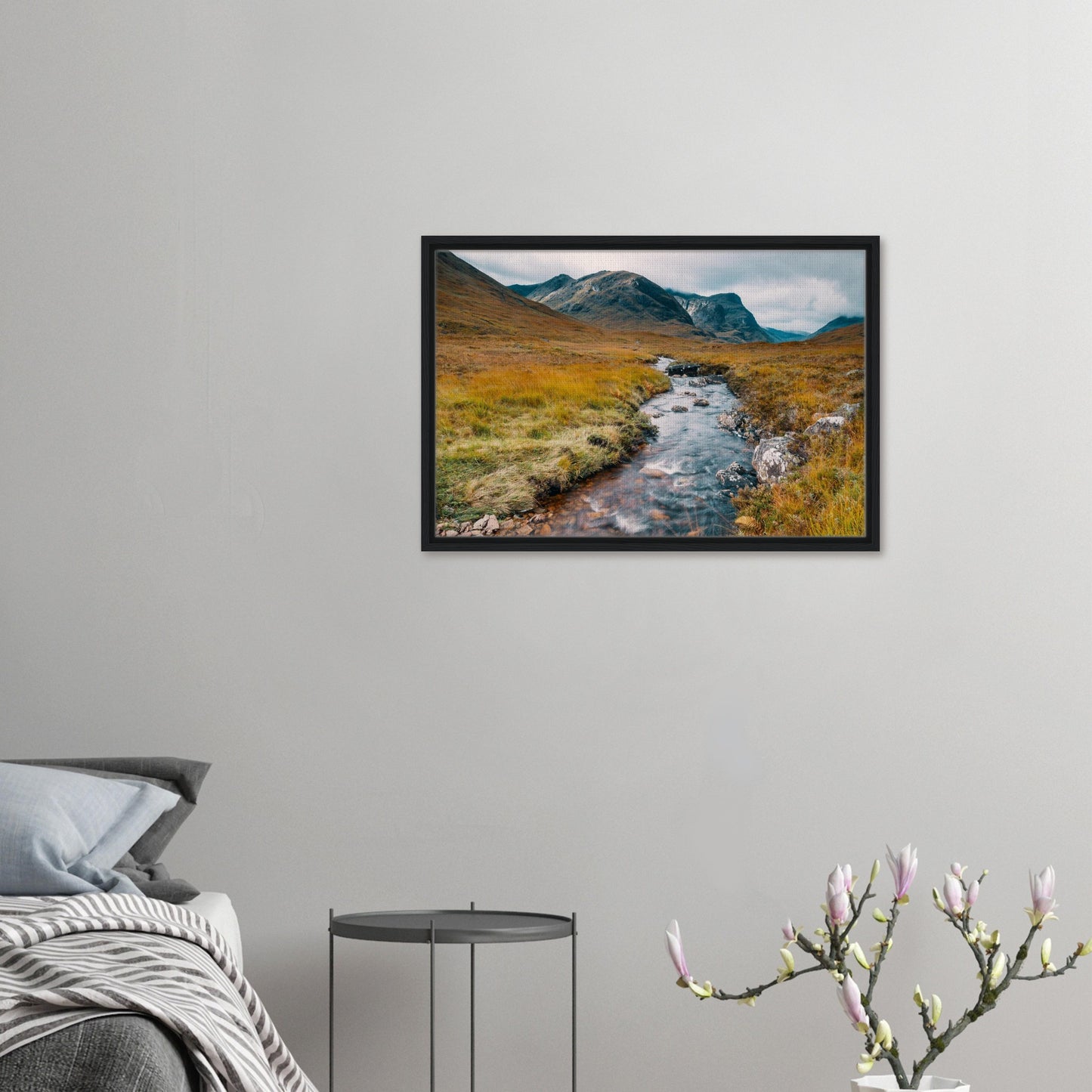 Silvery stream cutting through golden grasses