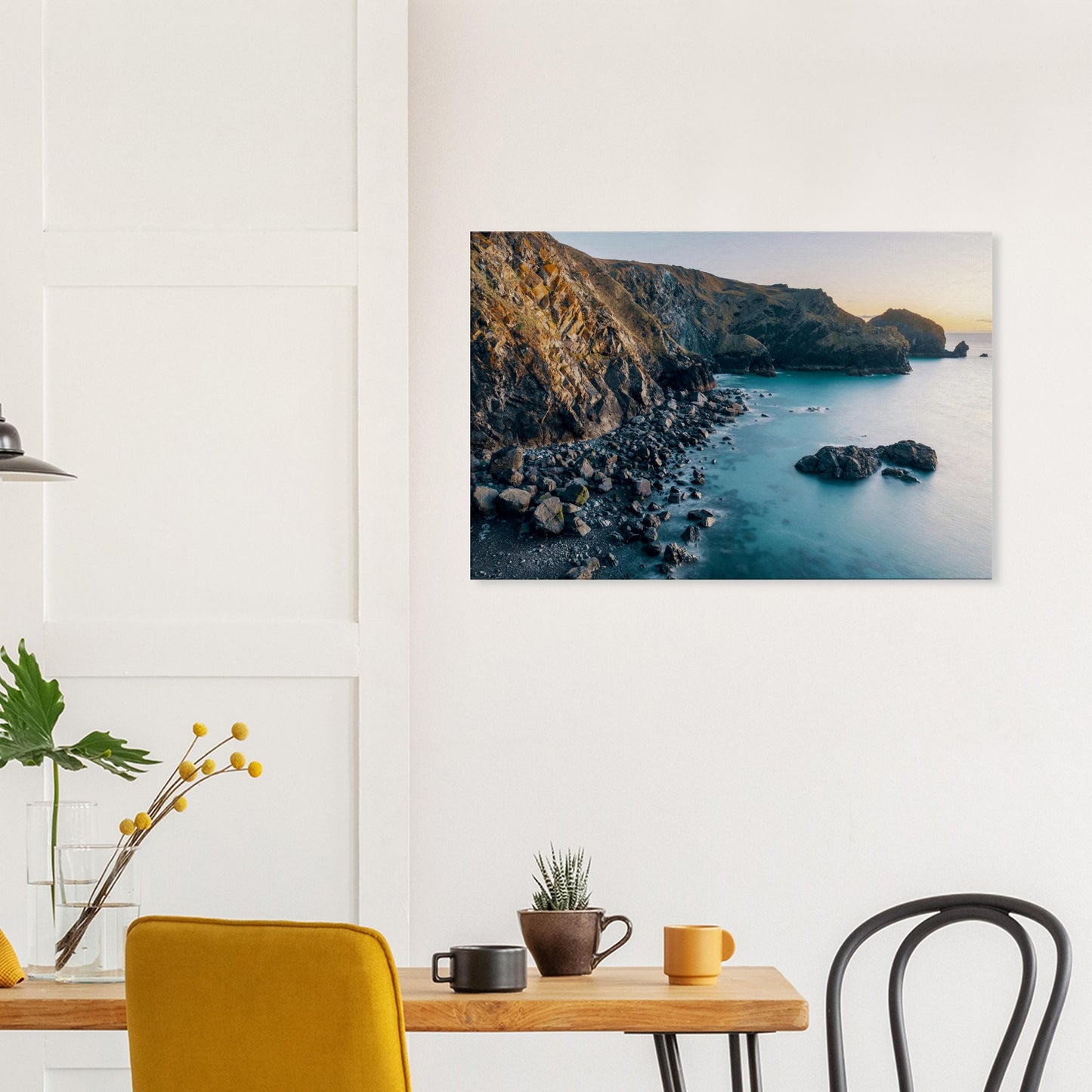 Sunset scene where ocean meets cliffs in a quiet corner of Cornwall’s dramatic coastline