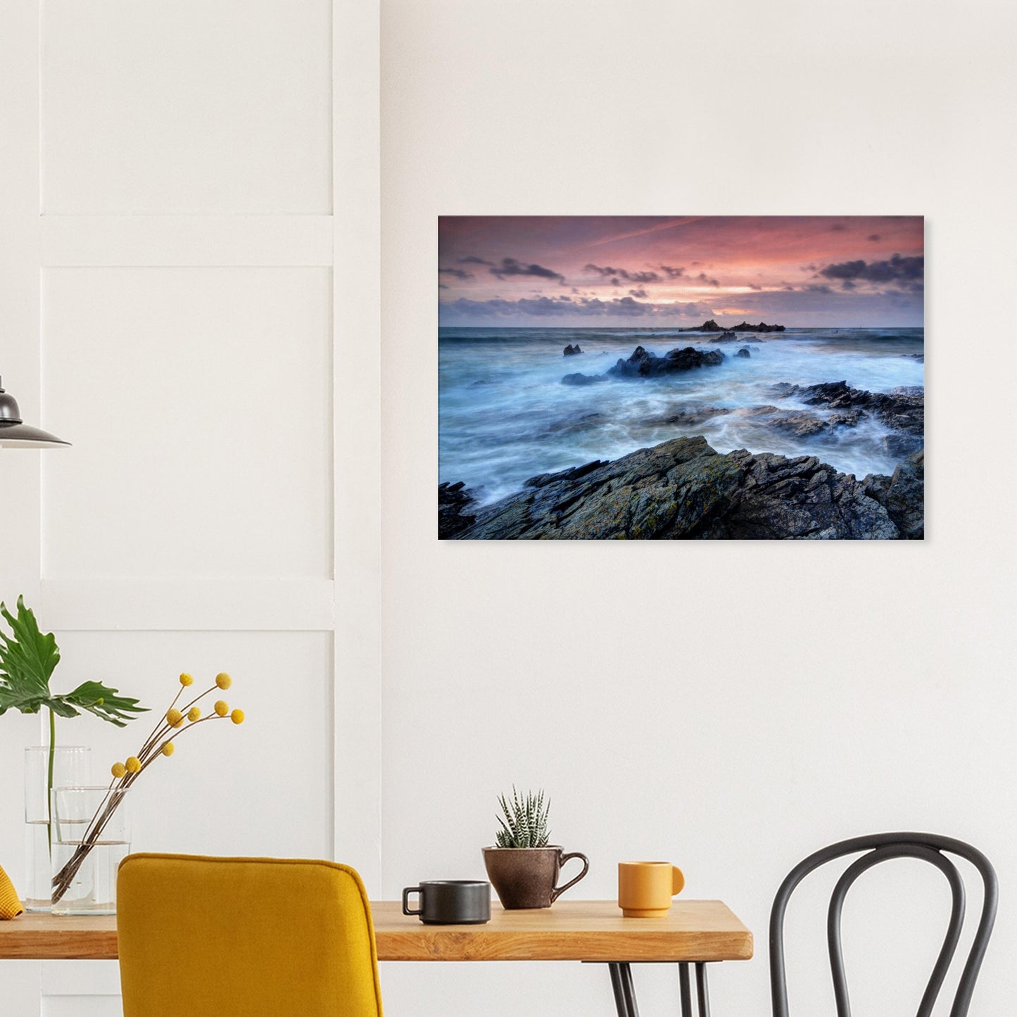 Canvas print of Heybrook Bay’s dynamic shoreline with swirling sea, rocky outcrops, and a fiery sky fading into evening.