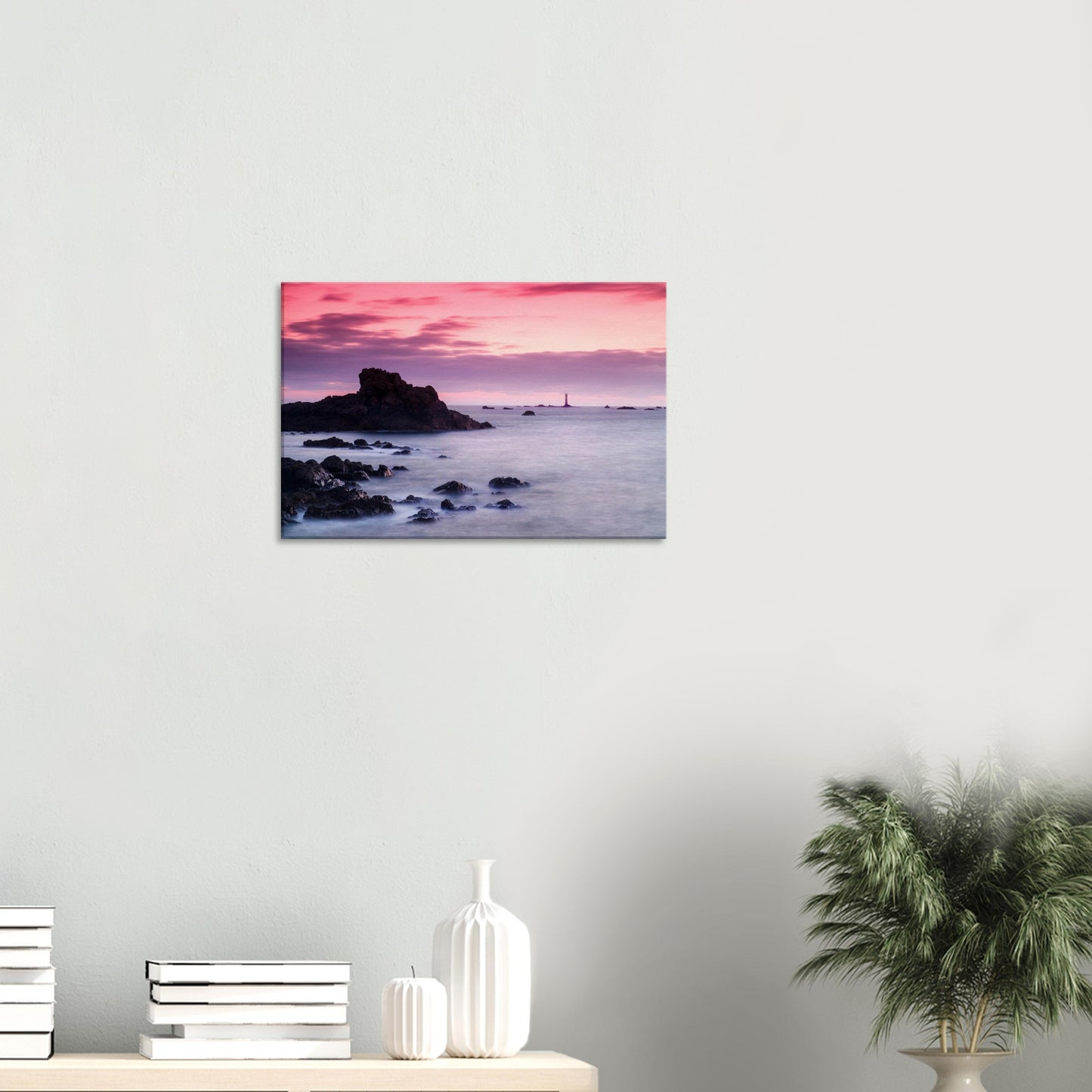 Seascape canvas of Les Hanois Lighthouse surrounded by tranquil waters and twilight colours on the Guernsey coast.