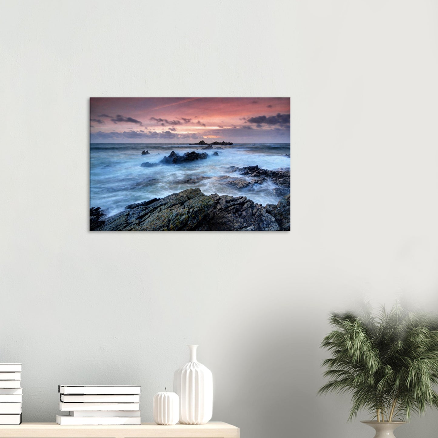Sunset landscape canvas print featuring Heybrook Bay’s dynamic sea motion, jagged rocks, and a glowing red-orange sky at dusk.