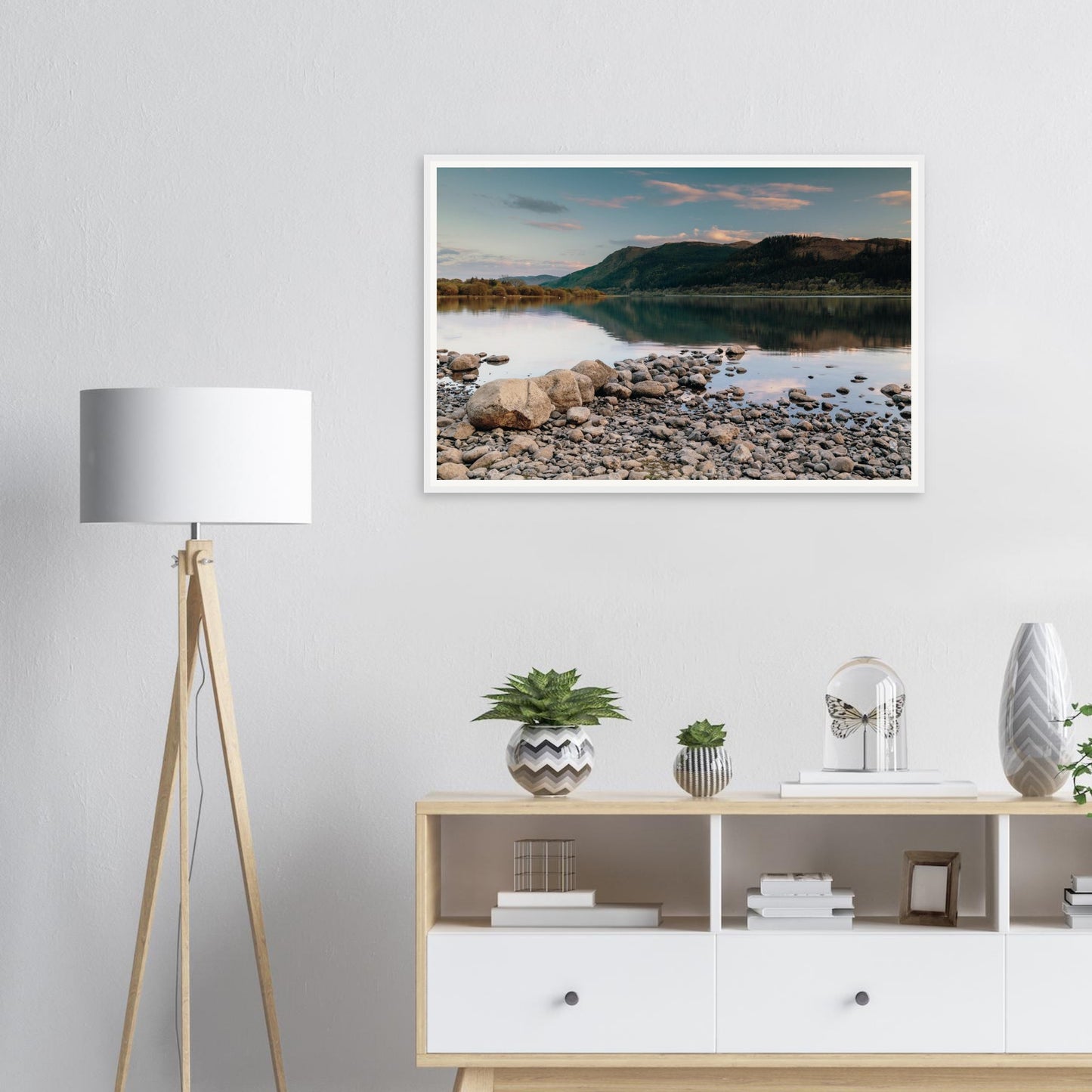 Framed print of Bassenthwaite Lake with smooth stones in foreground