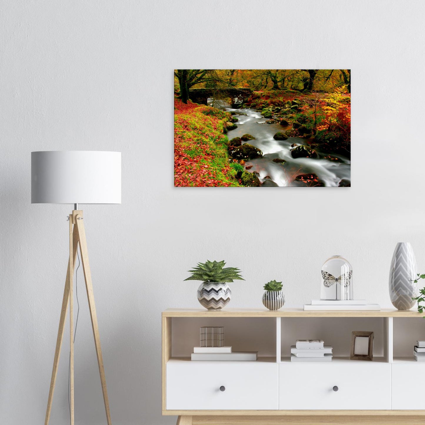 Burrator Reservoir autumn scenery with colourful woodland and river
