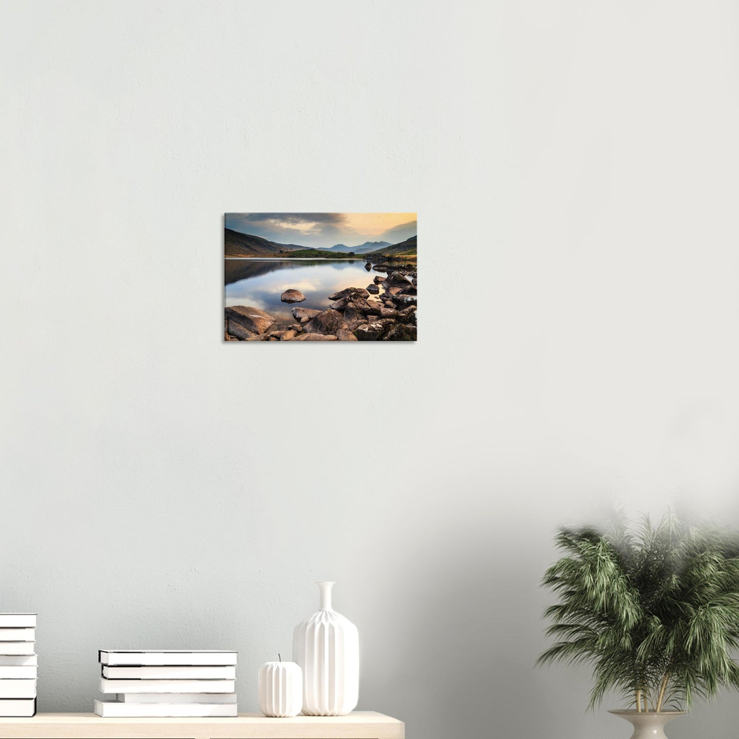 Canvas artwork showing majestic Snowdonia peaks silhouetted against a softly glowing sunset
