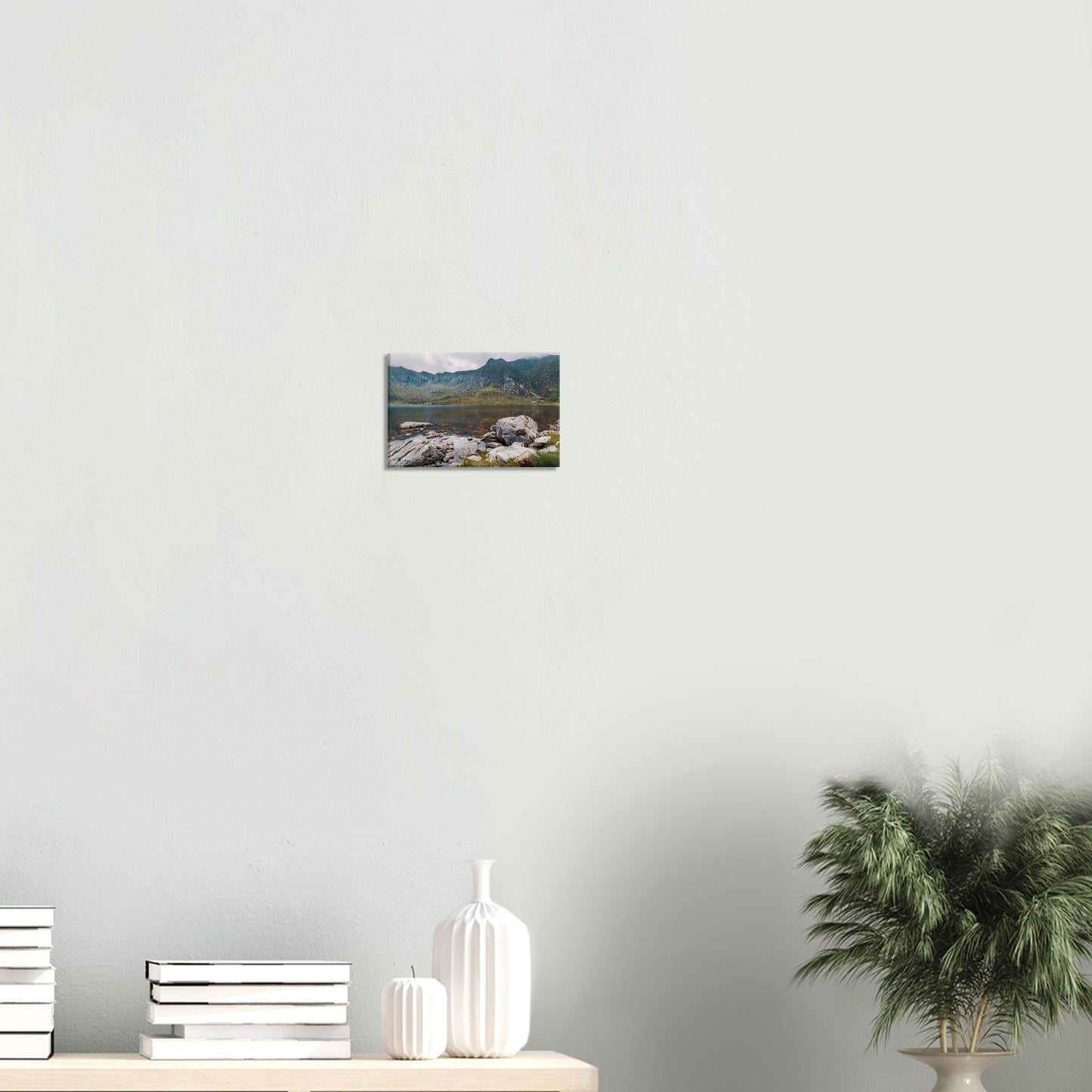 Rocky foreground and serene lake in Llyn Idwal canvas print