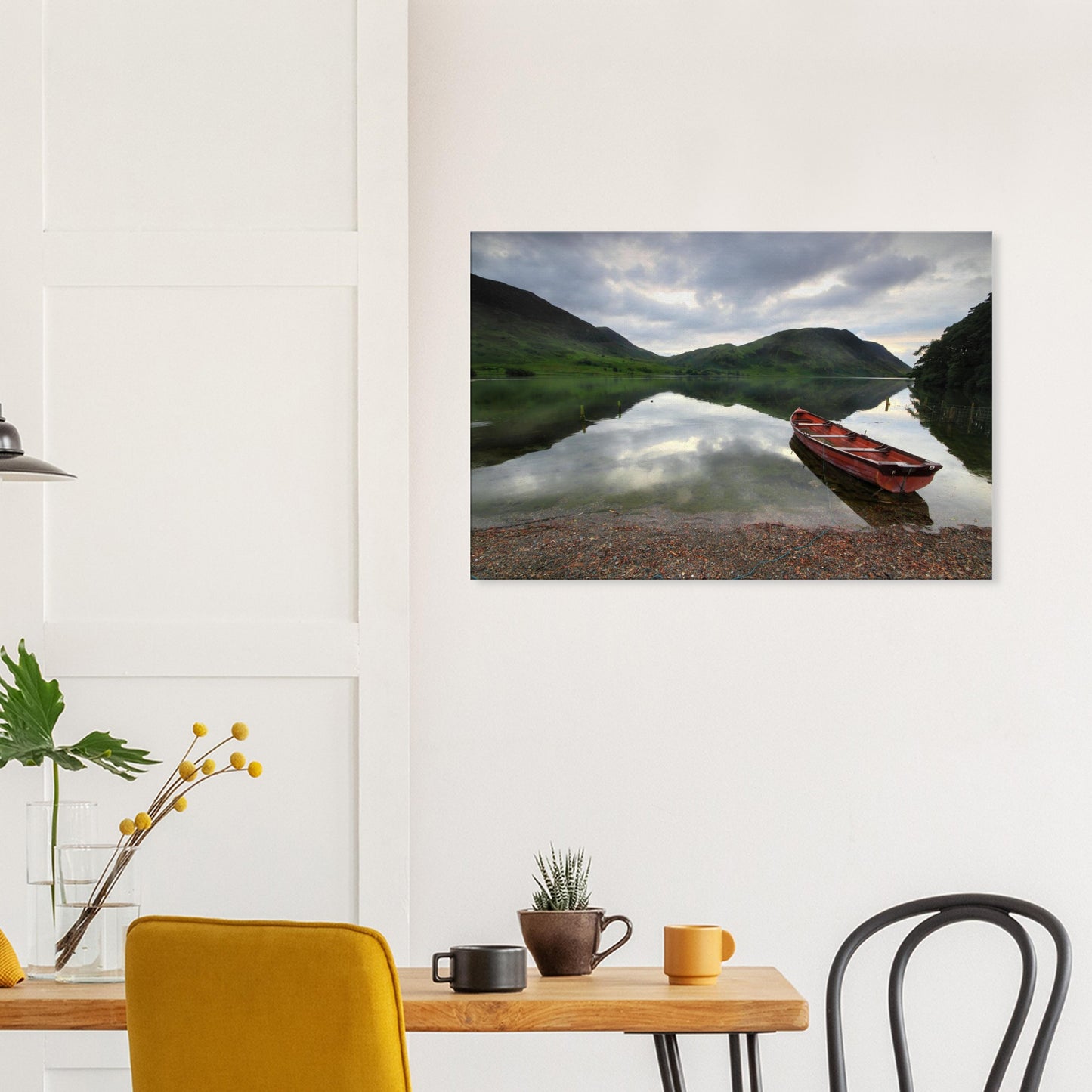 Red boat by reflective waters in the Lake District