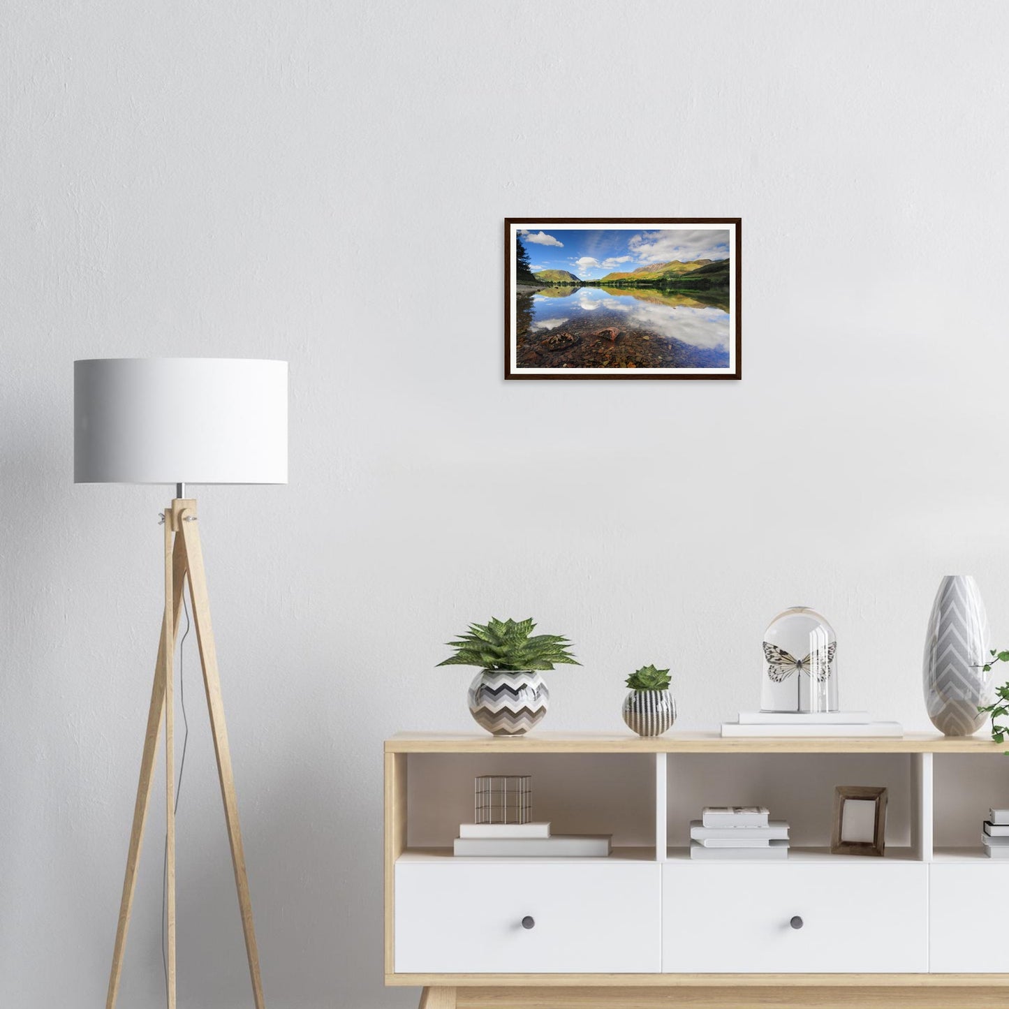 Perfect reflections of fells and clouds in Buttermere framed print