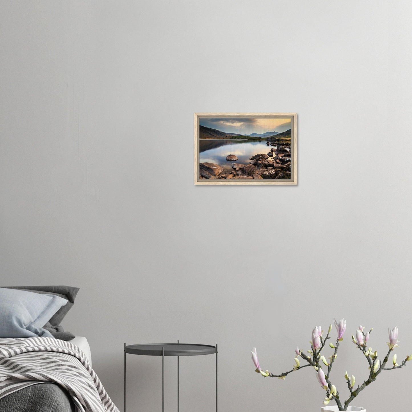 Snowdonia peaks silhouetted behind peaceful lake scene