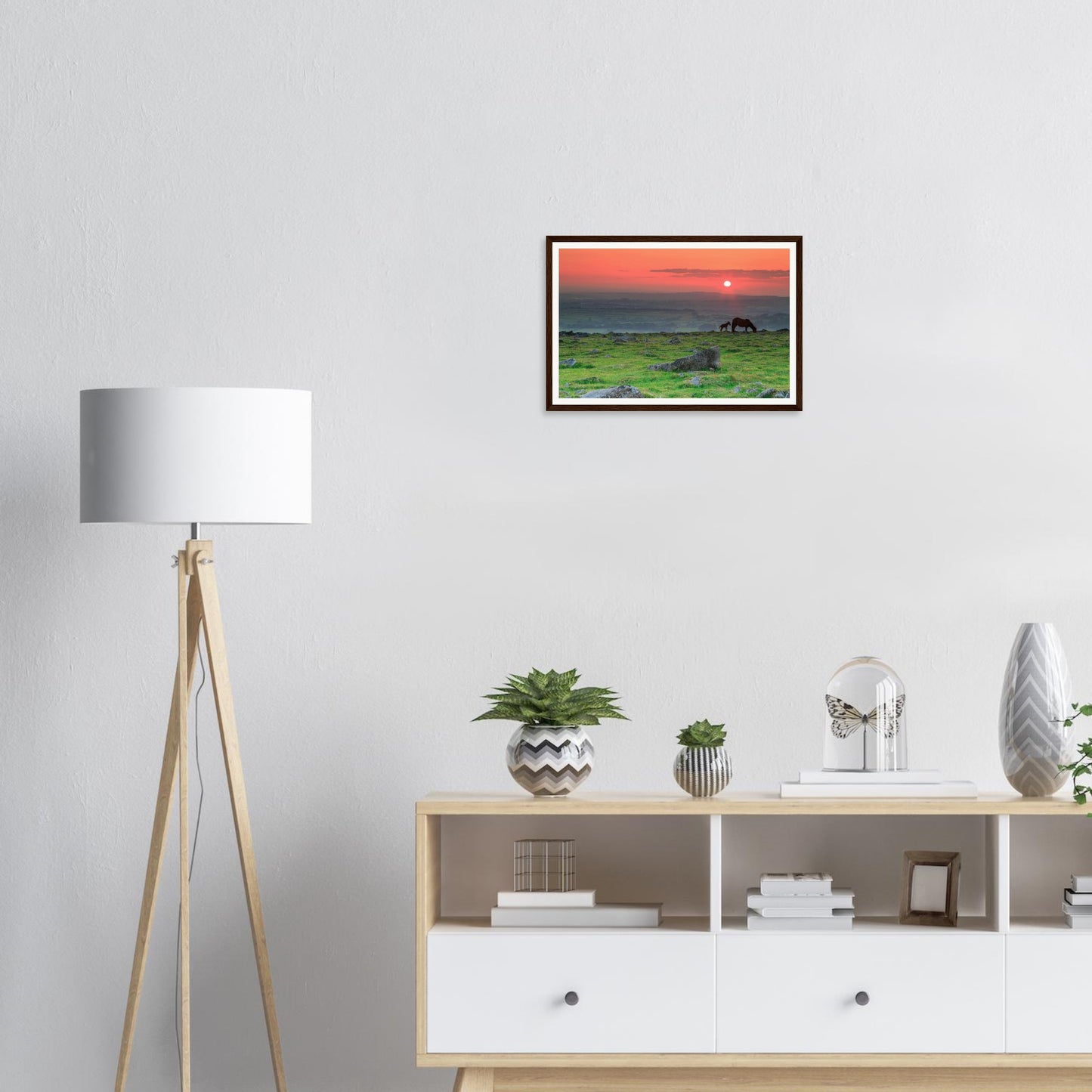 Scenic framed print of Dartmoor with mare and foal silhouettes
