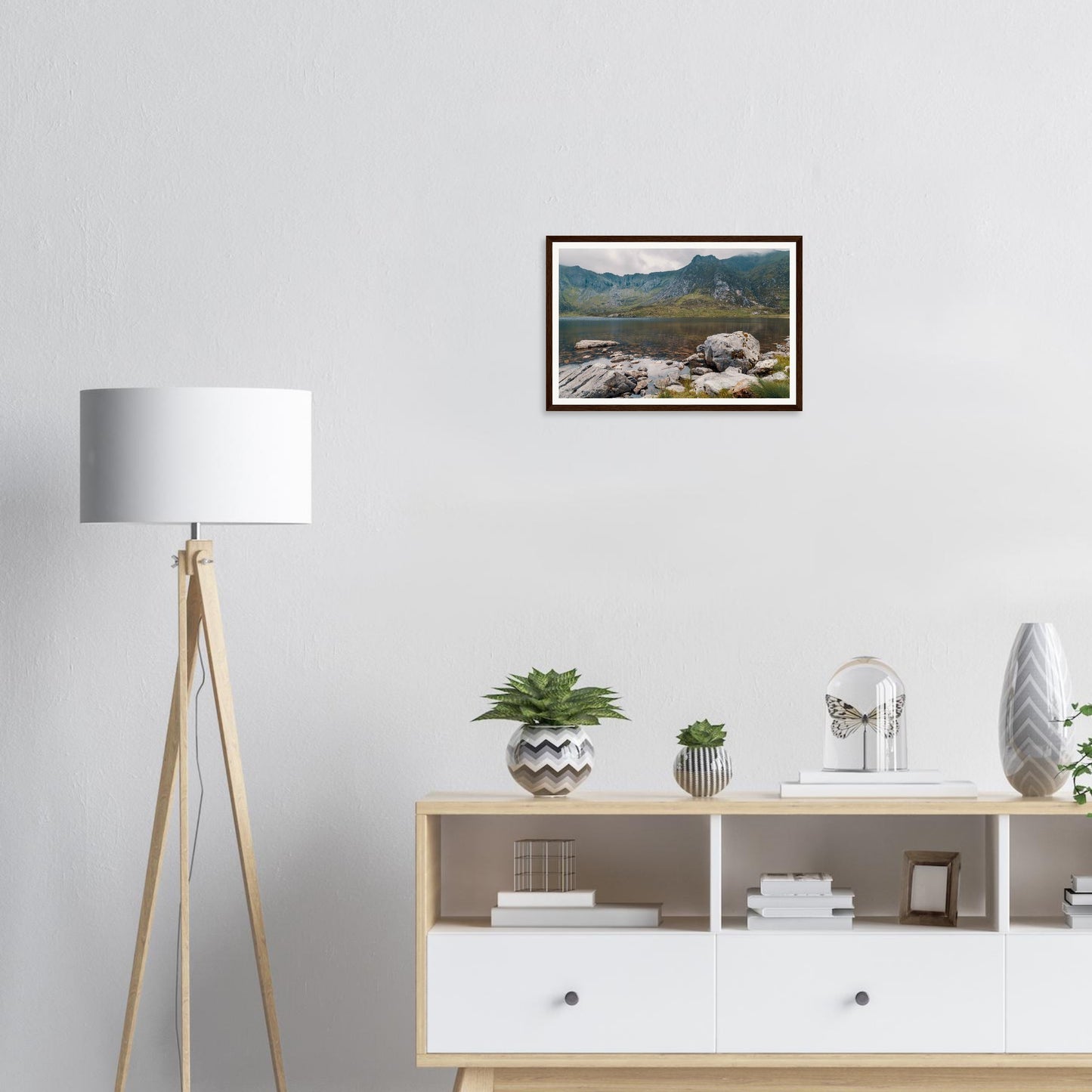 Framed print of Llyn Idwal cliffs and mountain reflections