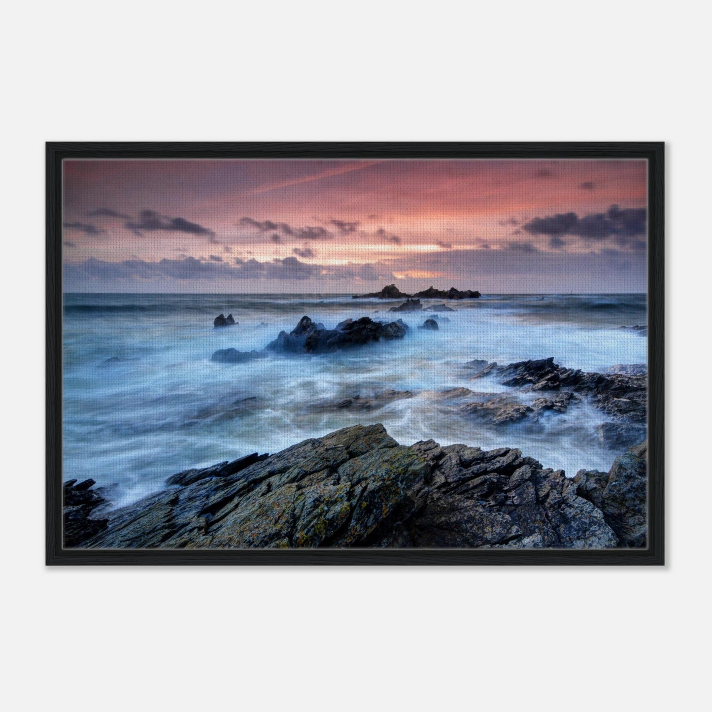 Fiery reds and oranges over Heybrook Bay in framed wall art