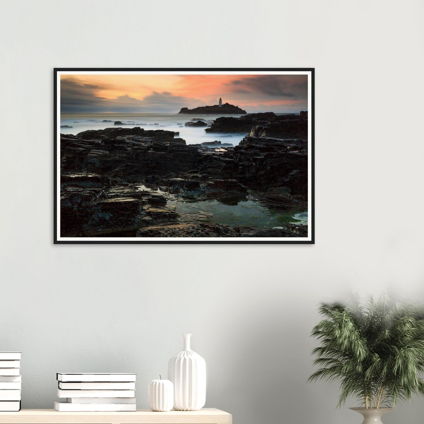 Atmospheric Cornish sunset framed print with lighthouse silhouette
