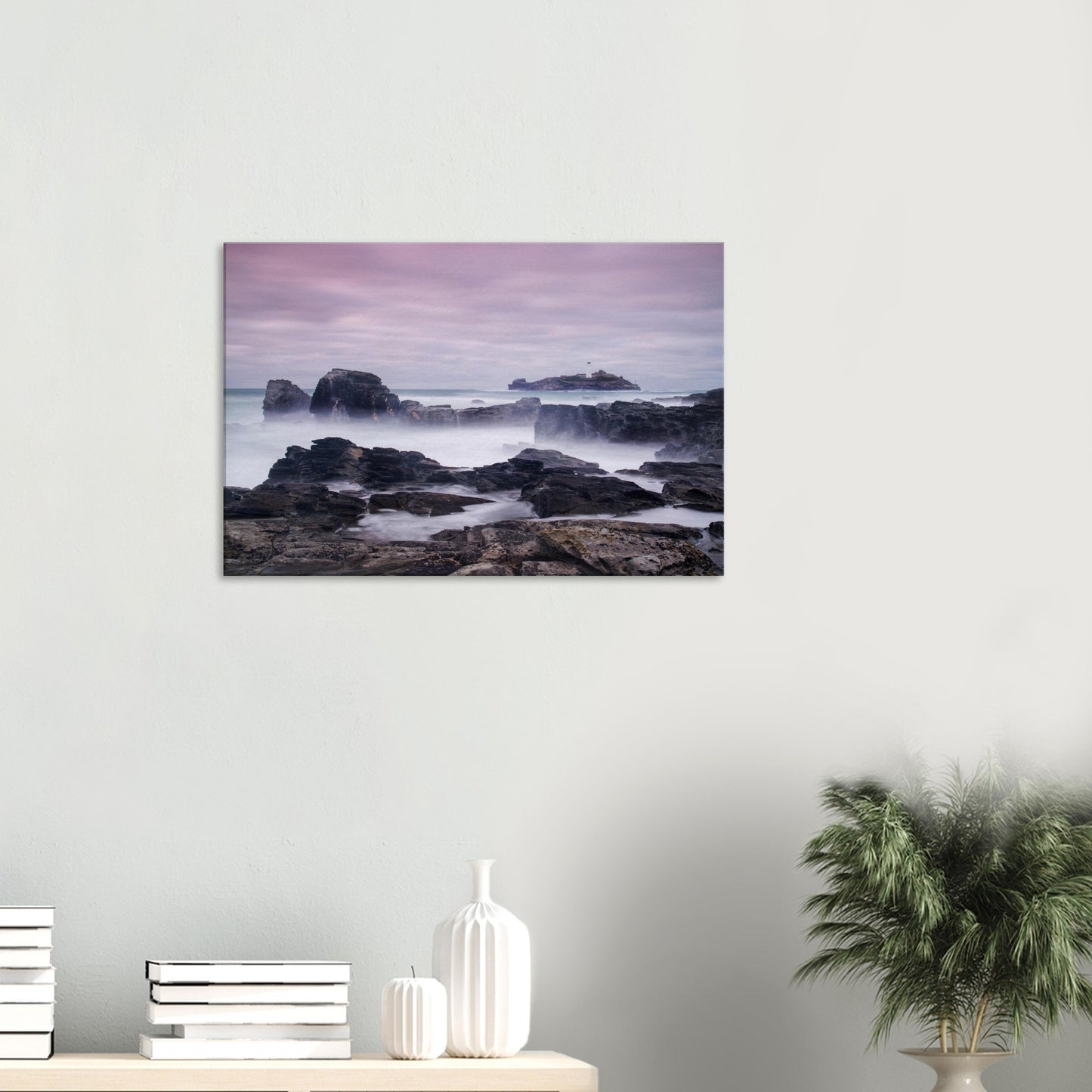 Godrevy Lighthouse canvas showcasing a dreamlike seascape with blurred waves, craggy rocks, and a serene, colourful sky.