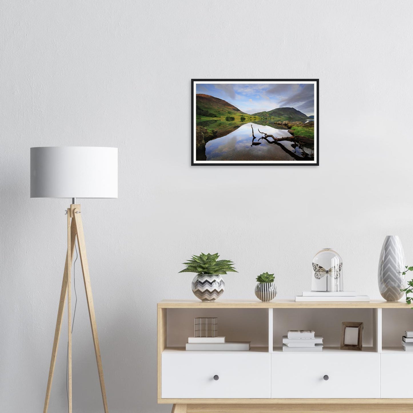 Serene reflections on Crummock Water with surrounding fells