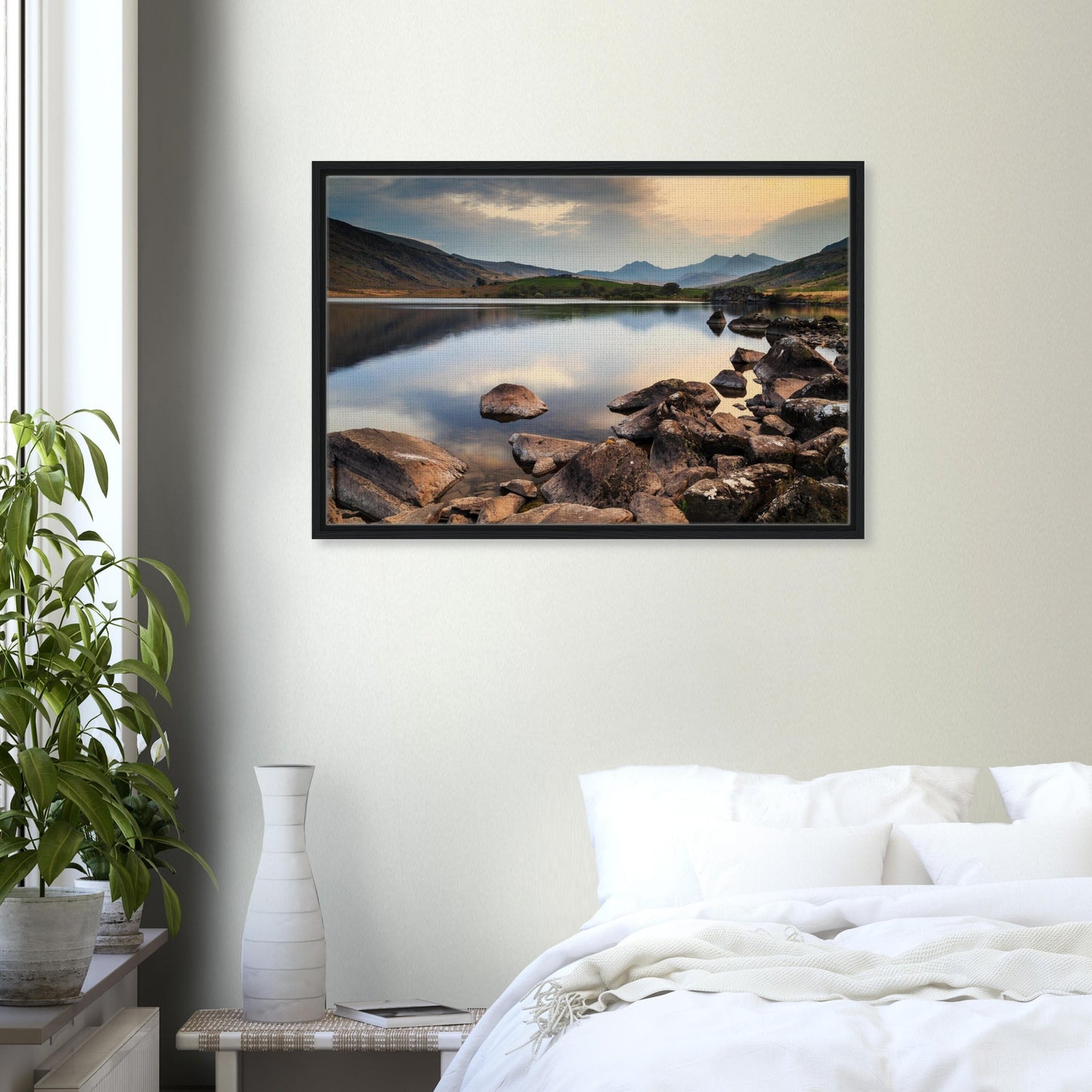 Rugged Snowdonia backdrop behind calm lake in framed art