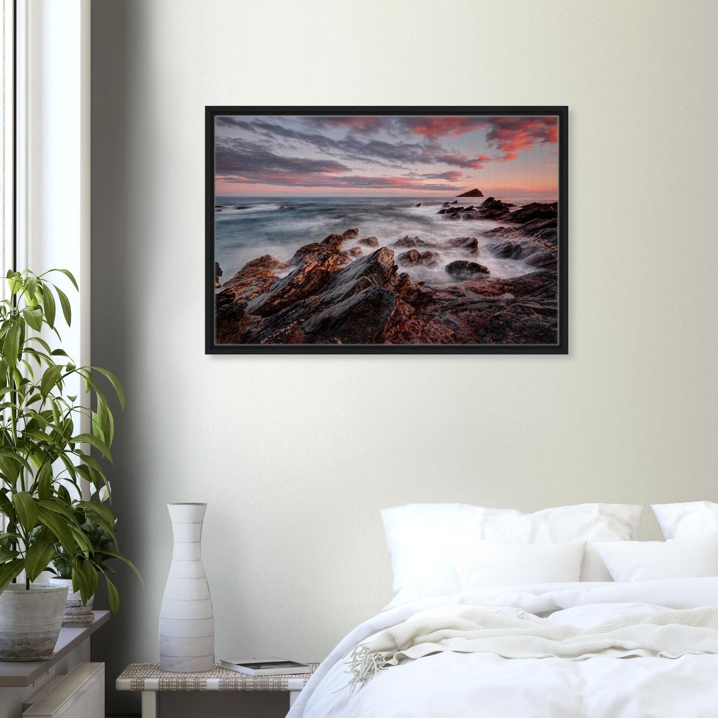 Coastal sunset scene with flowing sea and rugged rocks at Wembury