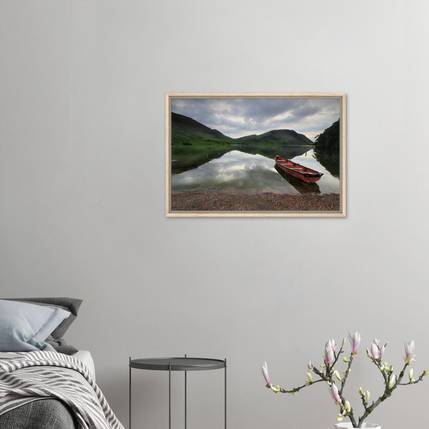 Tranquil Lake District lake with boat and fells in framed print