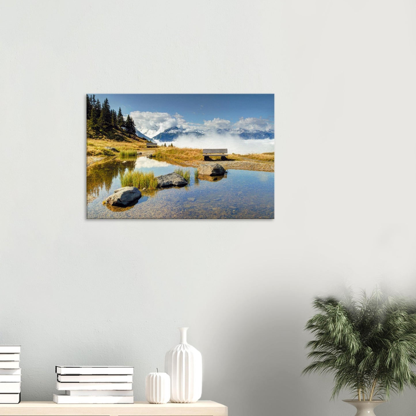 Tranquil Austrian canvas print with mountain reflections in a pond, a quiet bench, and cloud-covered hills at Resterhöhe.