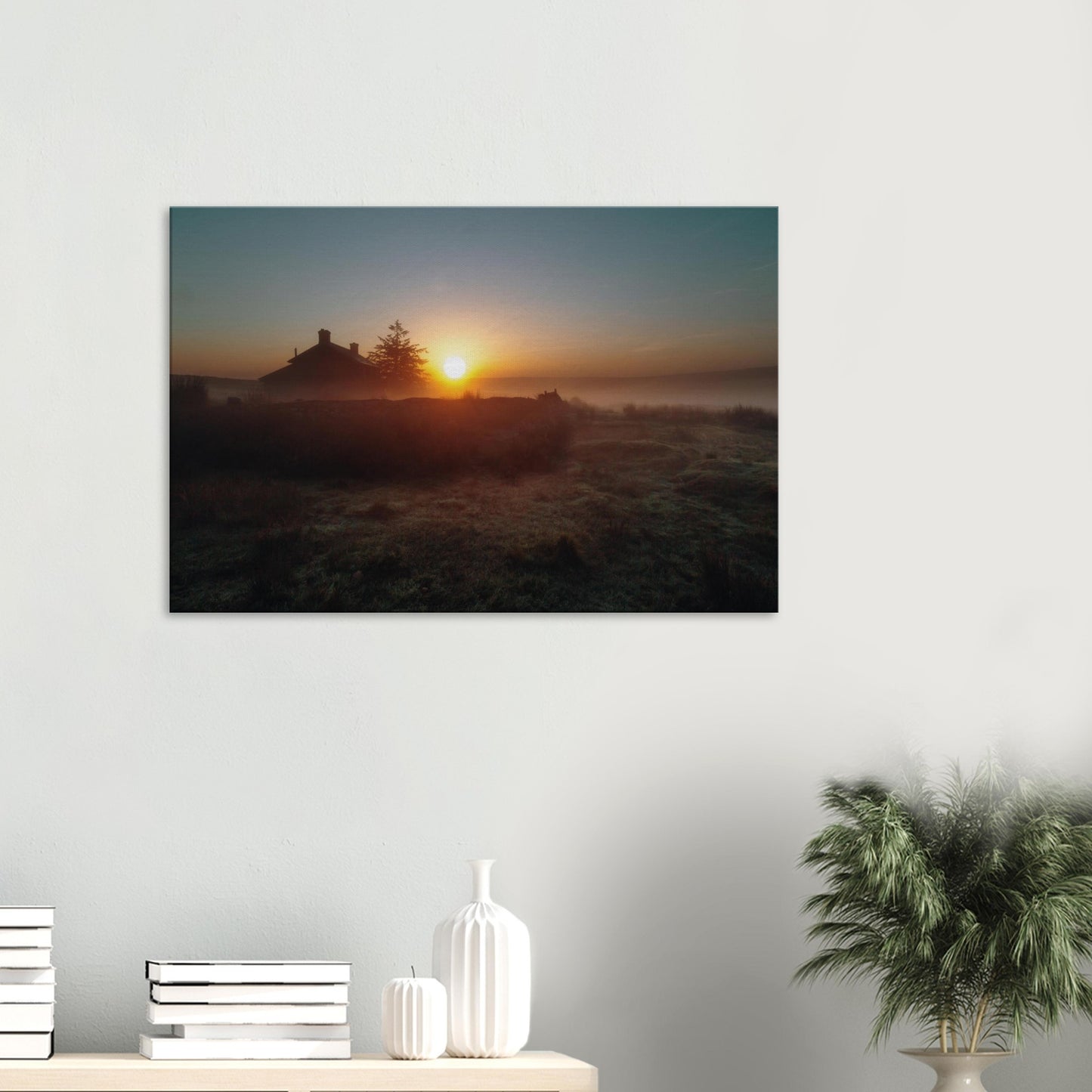 Sunrise over Nun’s Cross Farm in Dartmoor National Park with morning mist