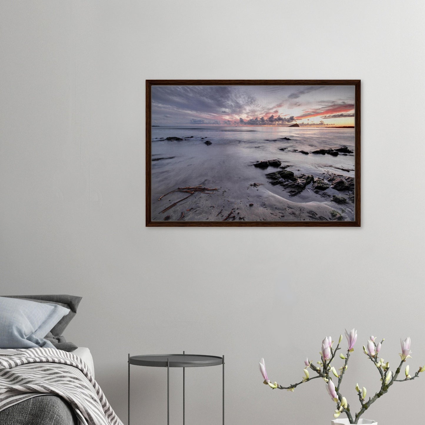Soft tide on Wembury sands with scattered rocks in framed print