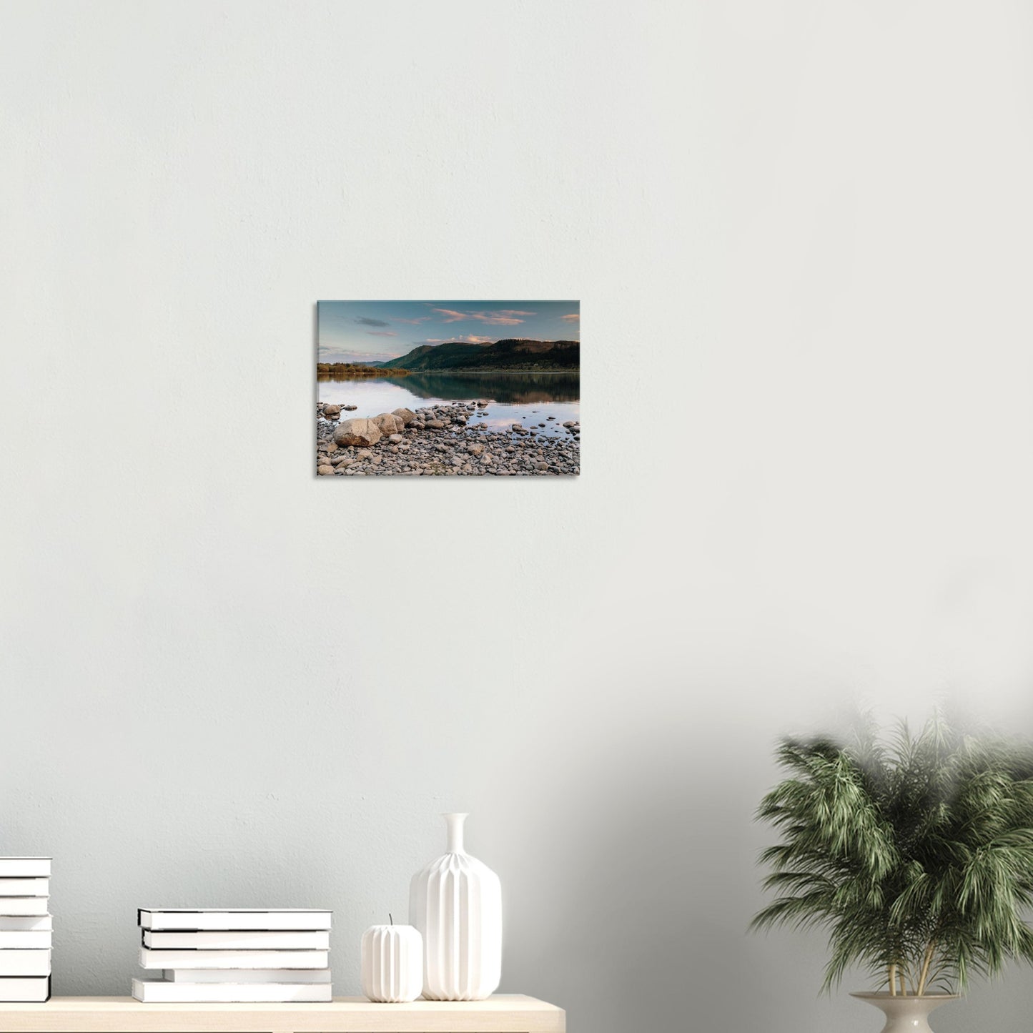 Peaceful Lake District scene with still lake and gentle evening light