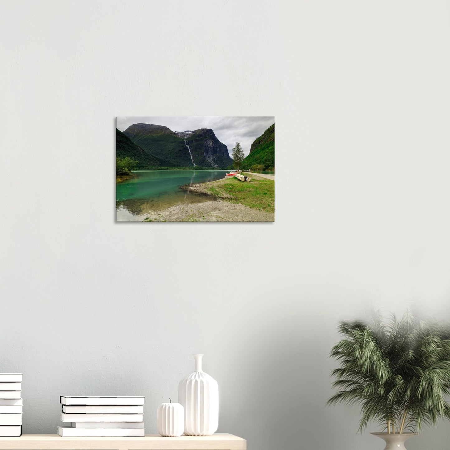 Canvas art capturing the dynamic flow of Utigardsfossen Waterfall beneath the imposing Ramnefjell mountain