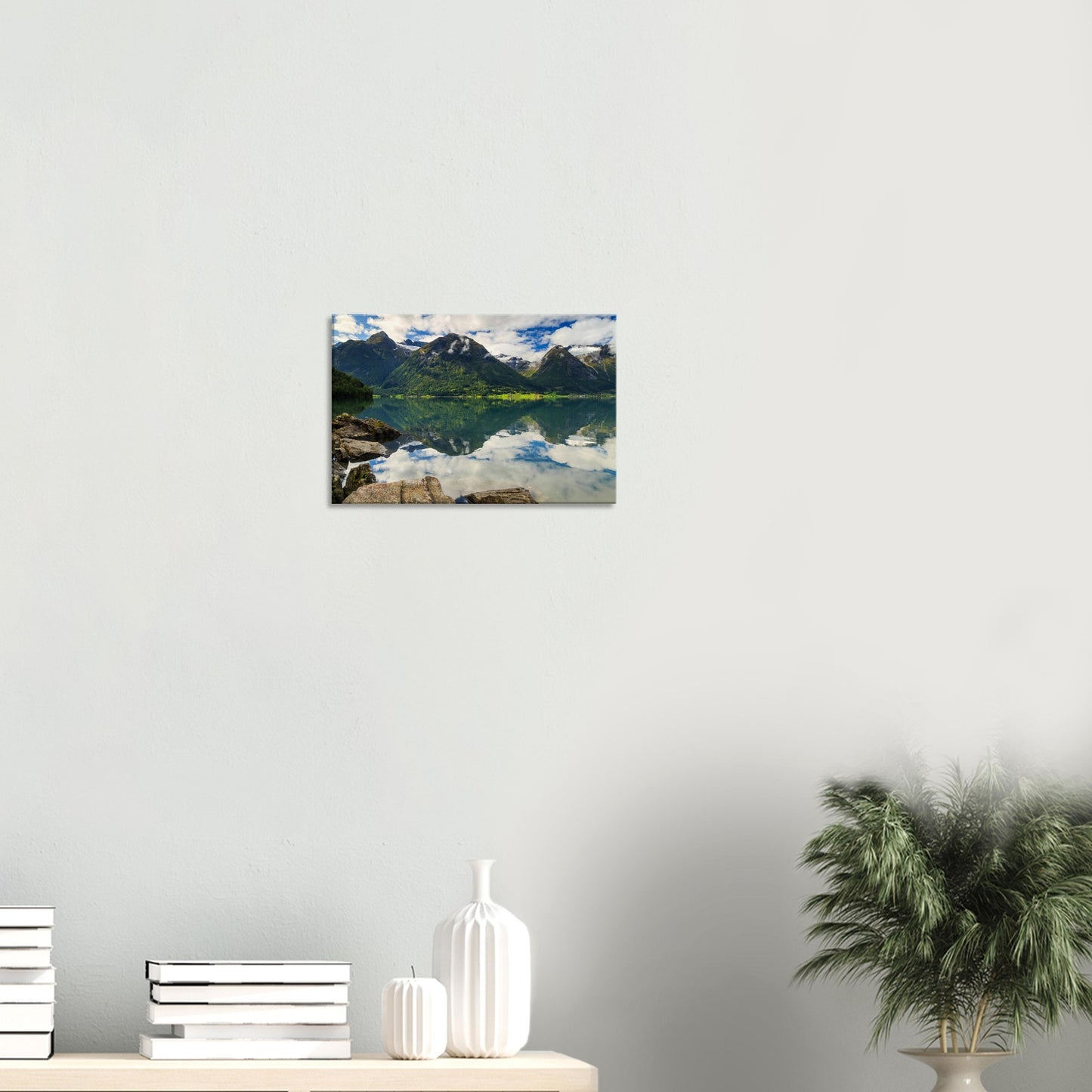 Inviting vista of Strynevatnet Lake where serene waters mirror sky and rugged alpine terrain
