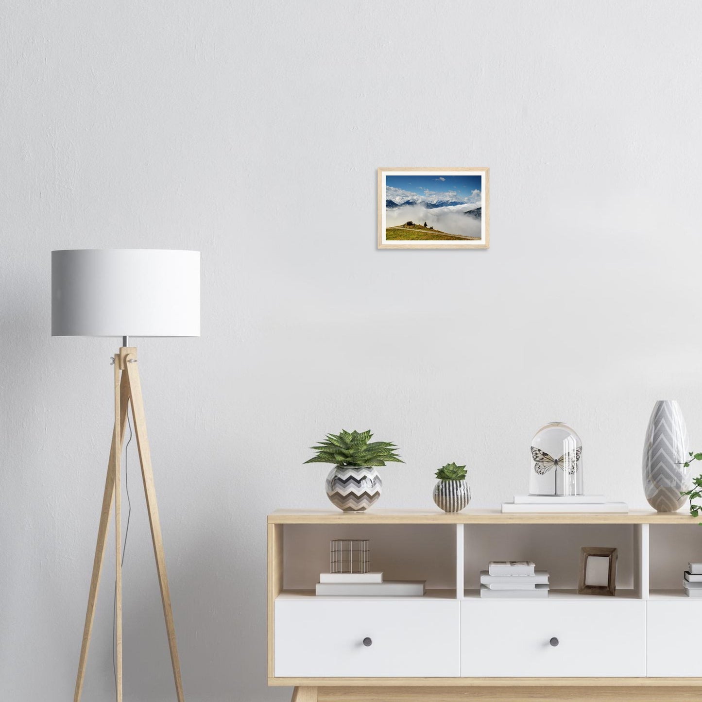 Scenic framed wall art of Austrian Alps with mountain hut and clouds