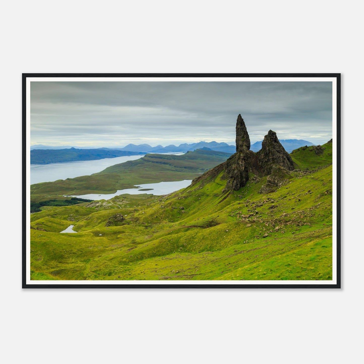 Towering pinnacle rock formation at The Old Man of Storr framed art