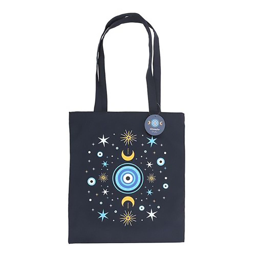 Dark blue polycotton tote bag featuring detailed all seeing eye with crescent moon and star accents.