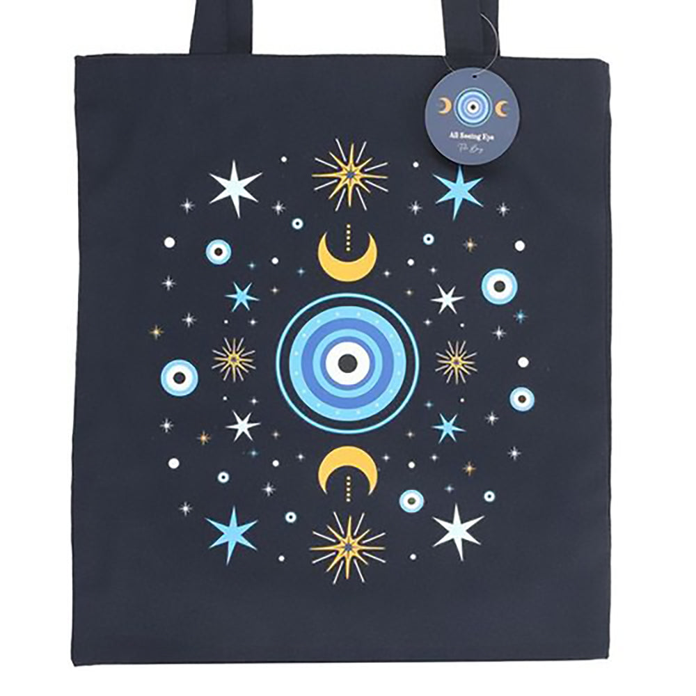 Dark blue polycotton tote bag featuring detailed all seeing eye with crescent moon and star accents.