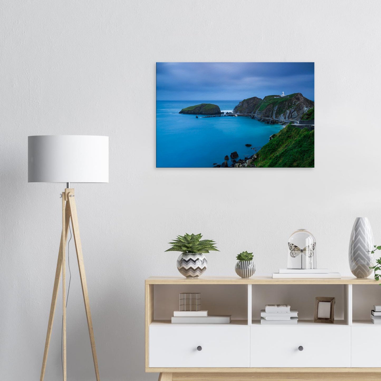 Canvas artwork of Landing Bay on Lundy Island under twilight, featuring a serene seascape, lighthouse, and a fading pier.
