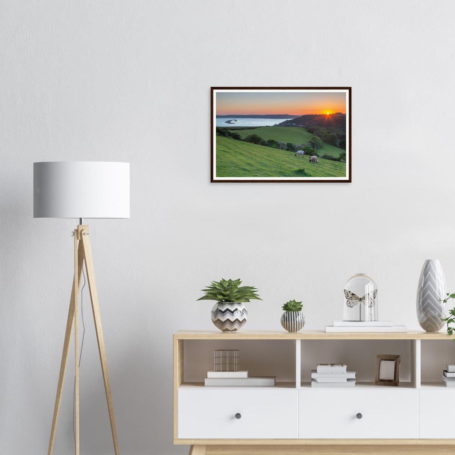 Sheep on hillside overlooking Plymouth Sound sunset framed print
