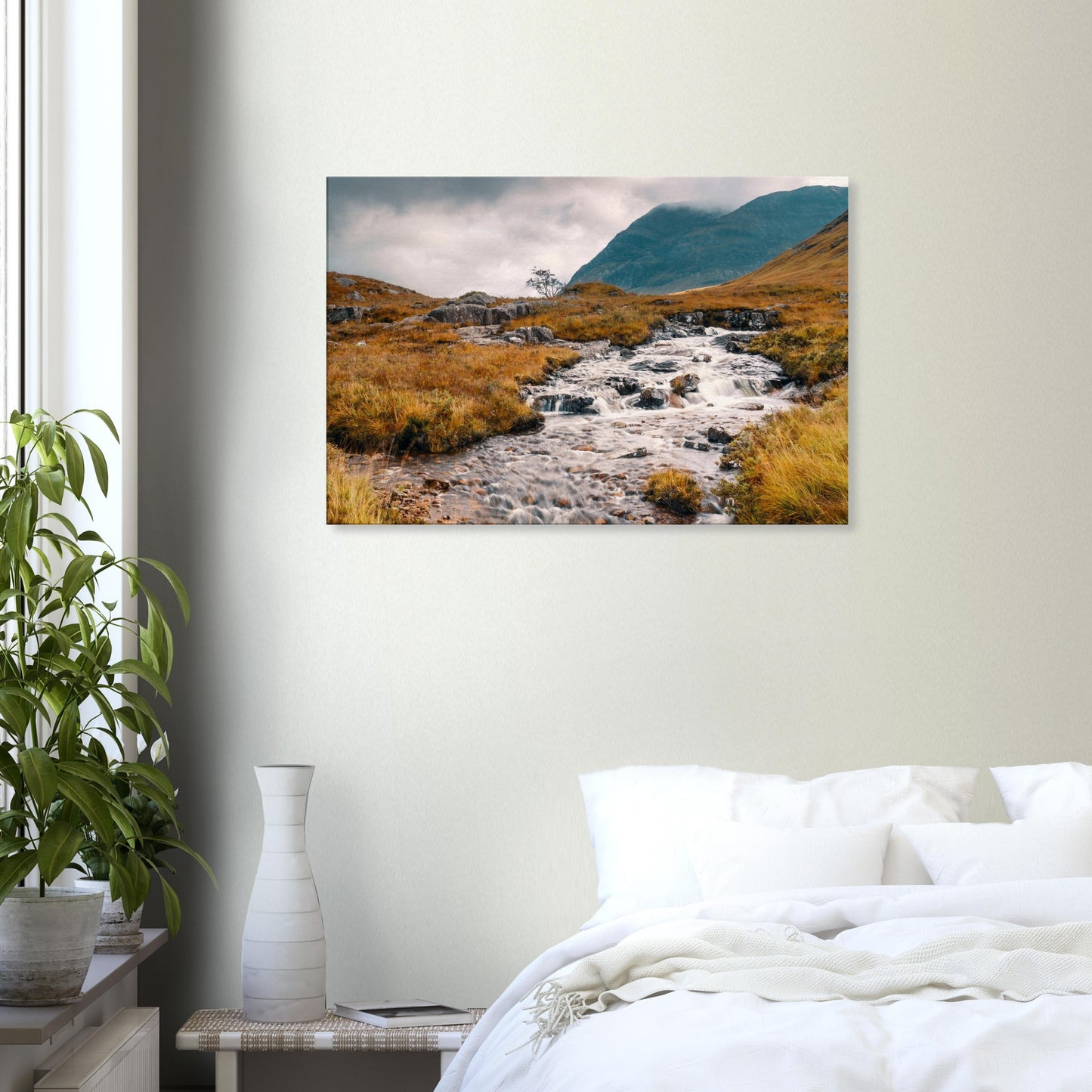 Mountain stream flowing through wild Glencoe valley