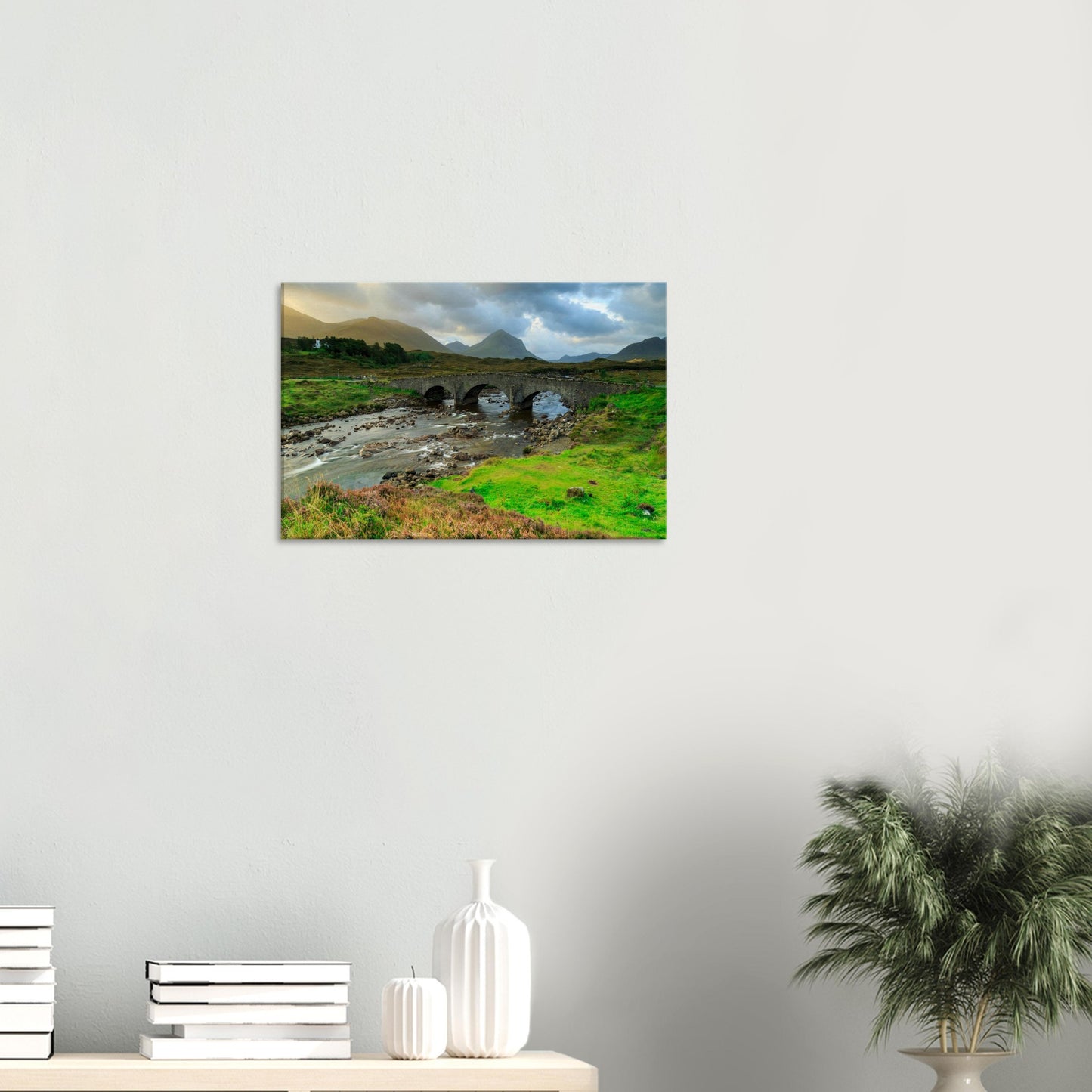 Canvas print showing Sligachan Old Bridge arching over a river with Skye’s iconic Cuillin range beyond.