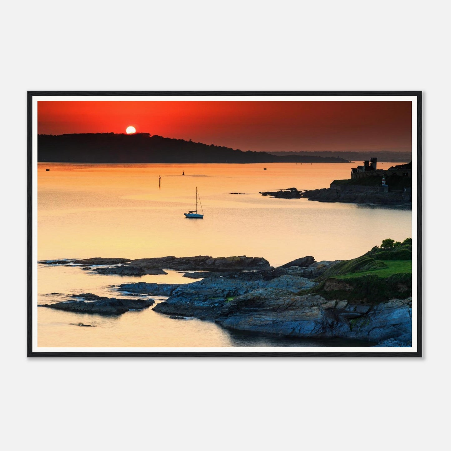 Golden sunset over calm waters of Plymouth Sound framed wall art