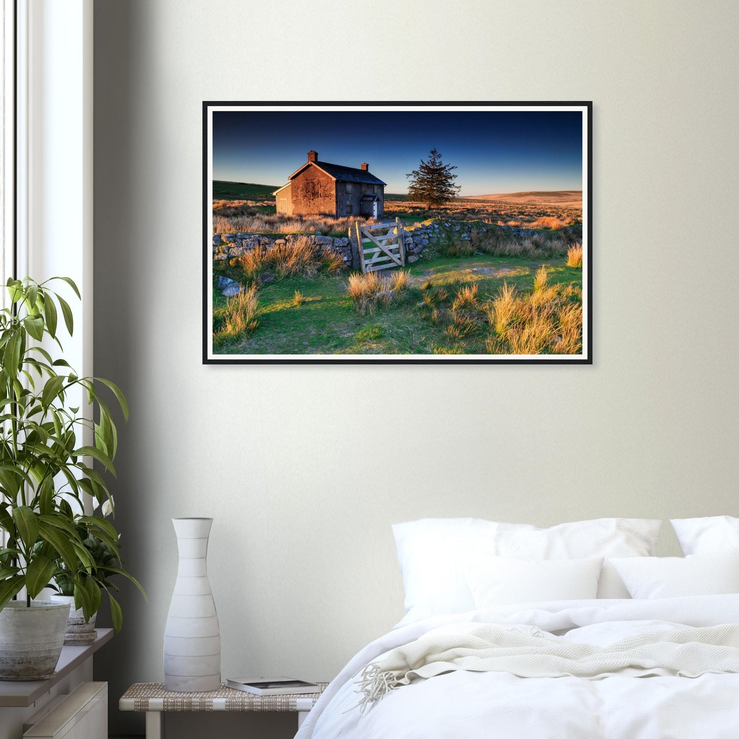 Sunrise glow across rugged moorland and farm framed print